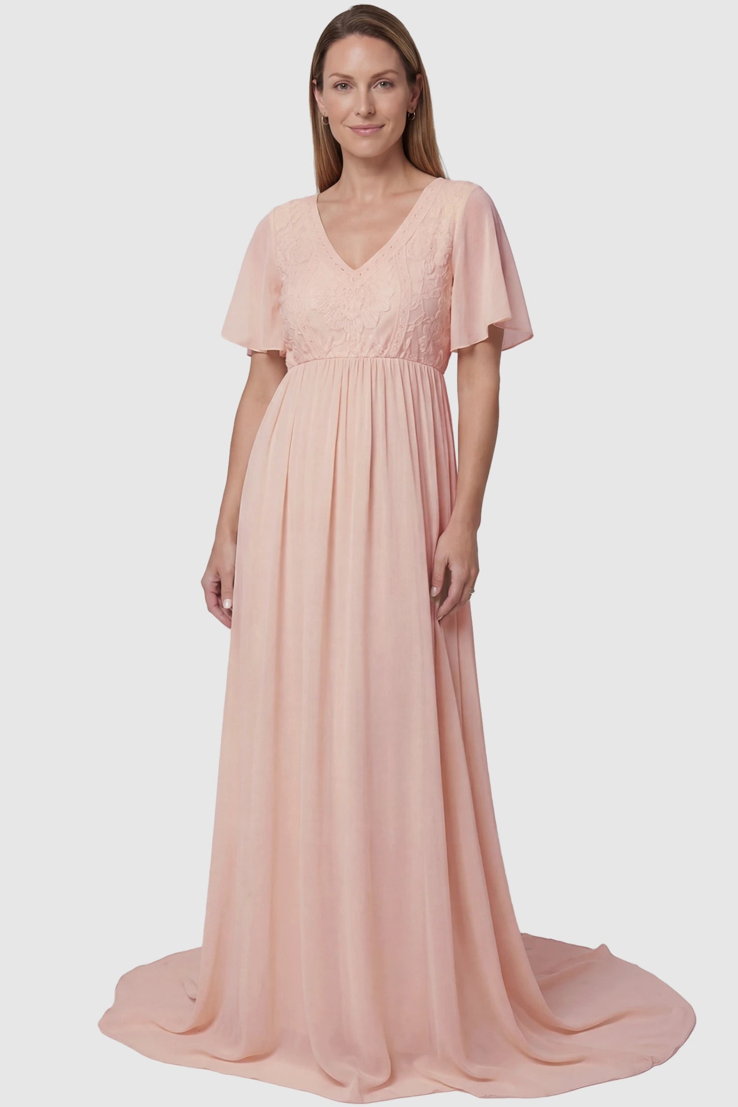 Lace Embroidered Short Flutter Sleeve Maternity Gown Lace embroidered short flutter sleeve maternity gown in pink with delicate lace embroidery & flutter sleeves, front view on postpartum model