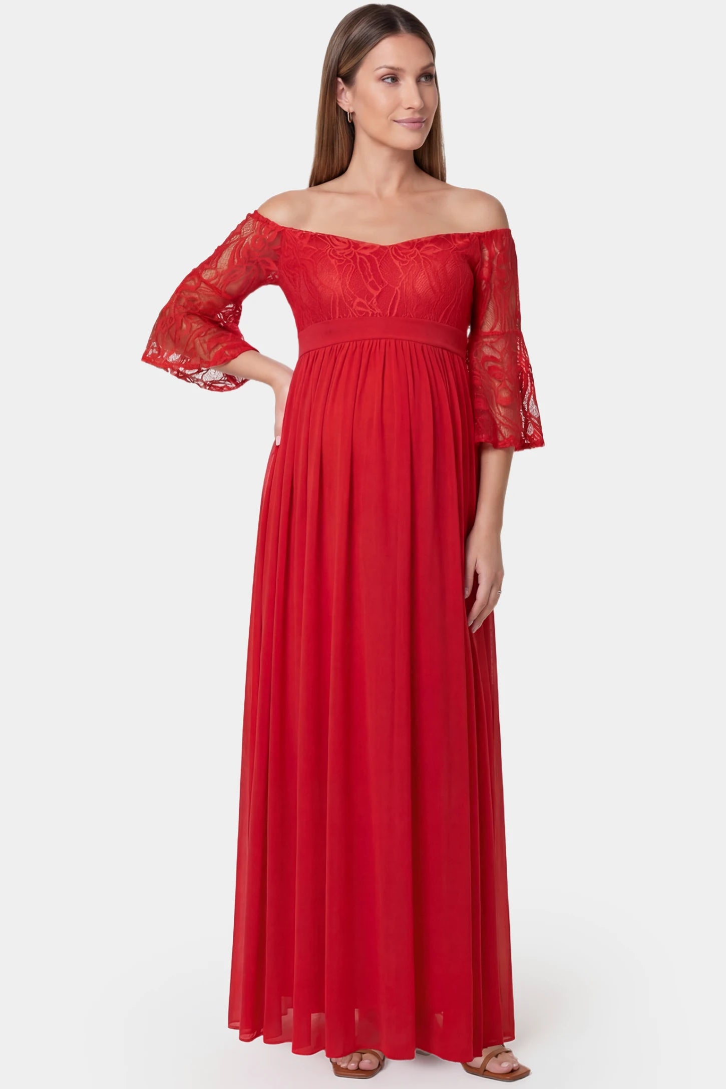 Lace-Spliced Off-Shoulder Flutter Sleeve Maxi Maternity Dress Lace-spliced off-shoulder flutter sleeve maxi maternity dress in red featuring romantic lace detailing and off-shoulder in front view on a pregnant model