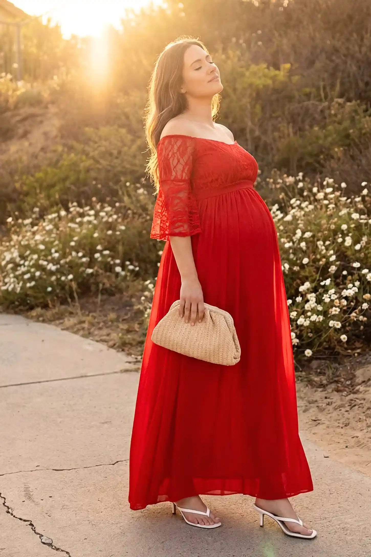 Lace-Spliced Off-Shoulder Flutter Sleeve Maxi Maternity Dress Lace-spliced off-shoulder flutter sleeve maxi maternity dress in red featuring flowing silhouette in full body view on a lifestyle image model
