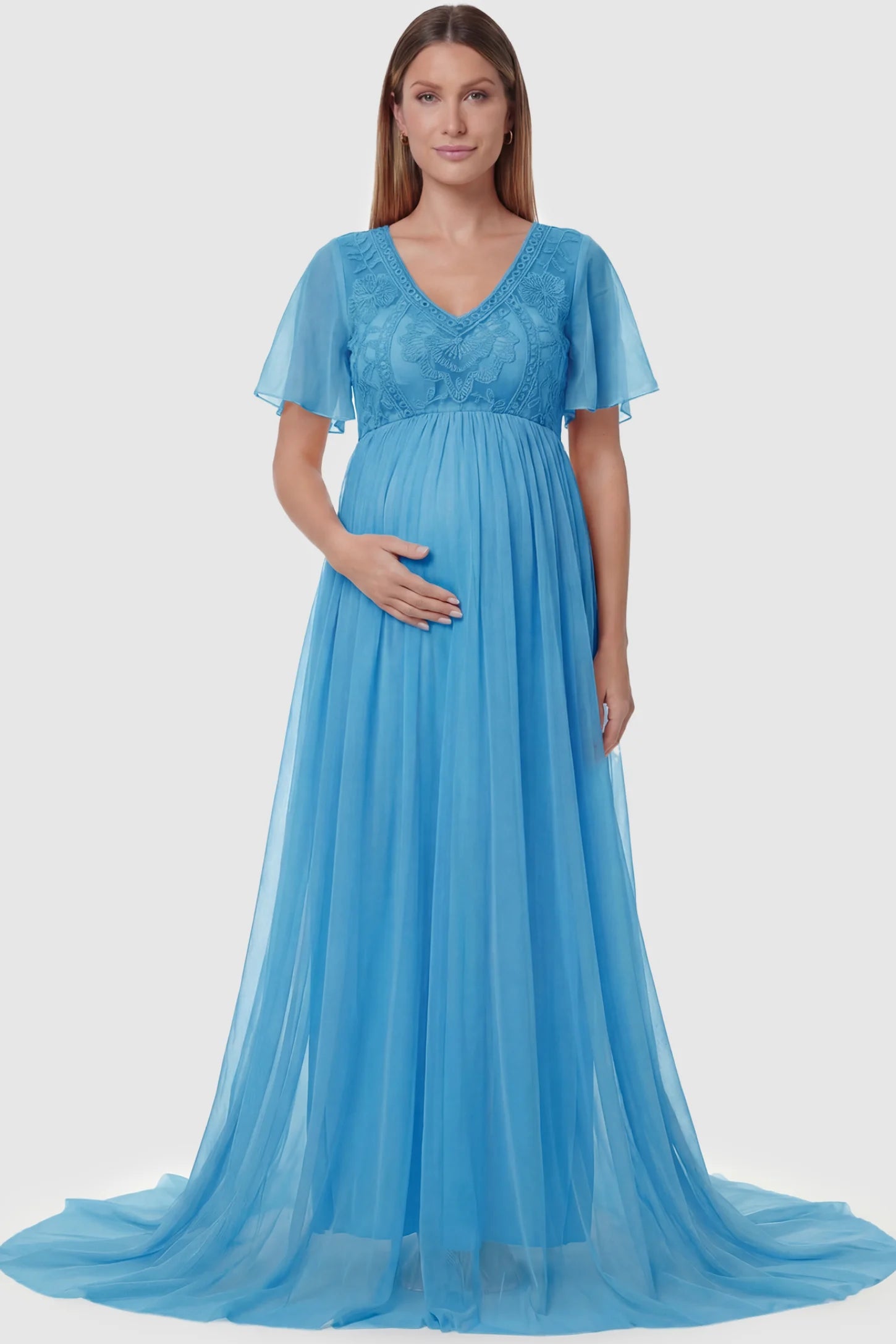Lace Embroidered Short Flutter Sleeve Maxi Maternity Gown Lace embroidered short flutter sleeve maxi maternity gown in sky blue featuring delicate lace embroidery in front view on a pregnant model