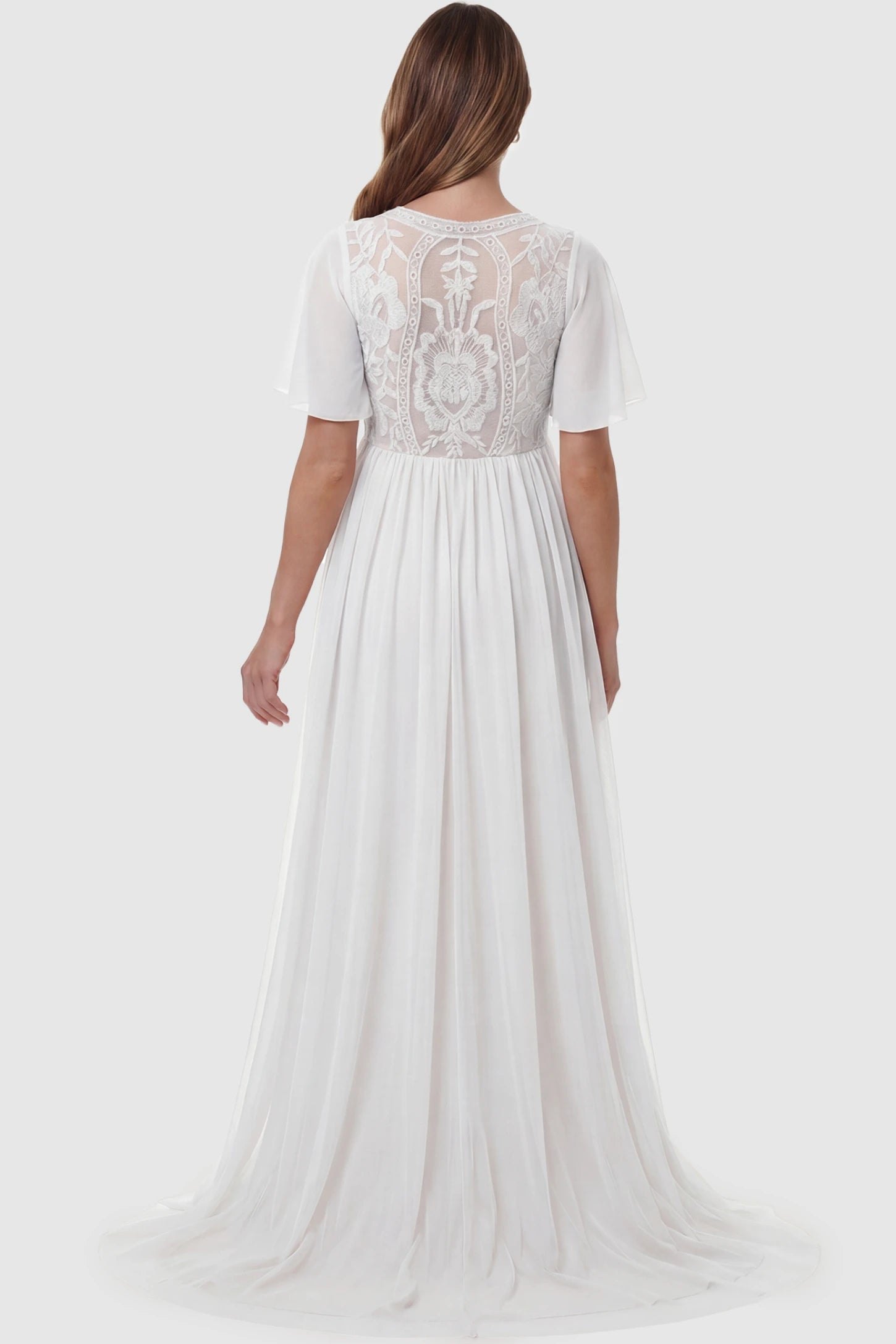 Lace Embroidered Short Flutter Sleeve Maxi Maternity Gown Lace embroidered short flutter sleeve maxi maternity gown in White featuring short flutter sleeve detail in back view on a pregnant model