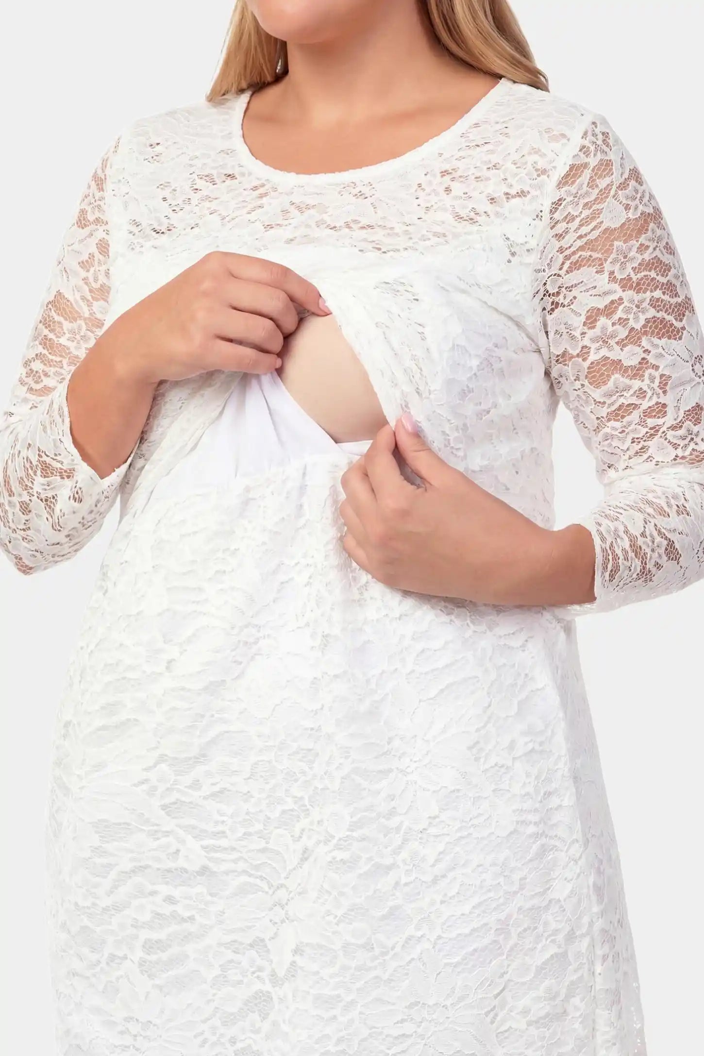 Lace Mid-Length Sleeve Midi Maternity & Nursing Dress Lace mid-length sleeve midi maternity and nursing dress in white featuring concealed nursing opening in front view on a pregnant model