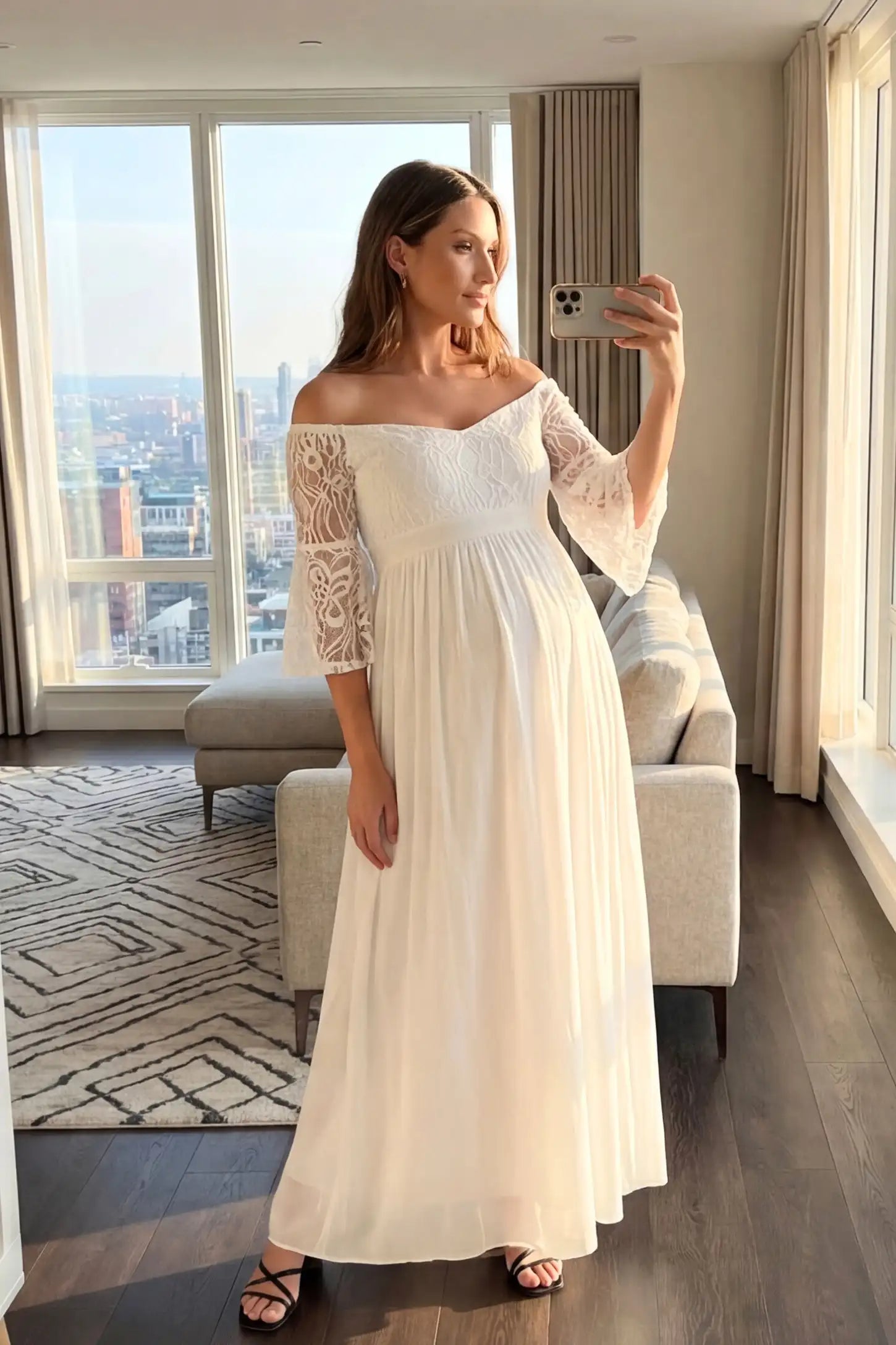 Lace-Spliced Off-Shoulder Flutter Sleeve Maxi Maternity Dress Lace-spliced off-shoulder flutter sleeve maxi maternity dress in white featuring flowing silhouette in full body view on a UGC model