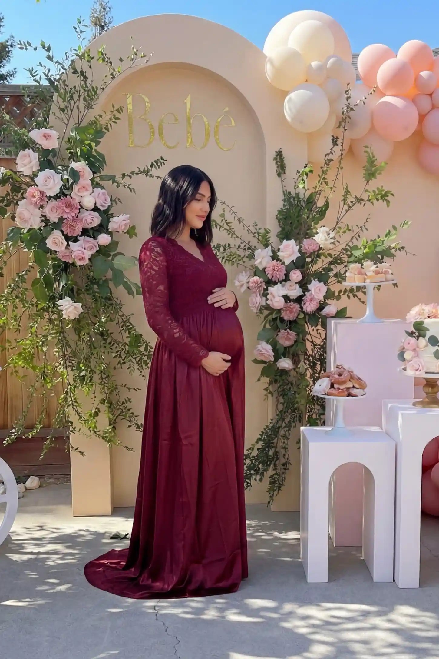 Lace-Spliced Silk Long Sleeve Maxi Maternity Dress Lace-spliced silk long sleeve maxi maternity dress in wine red featuring lace bodice and sleeves in front view on a UGC model