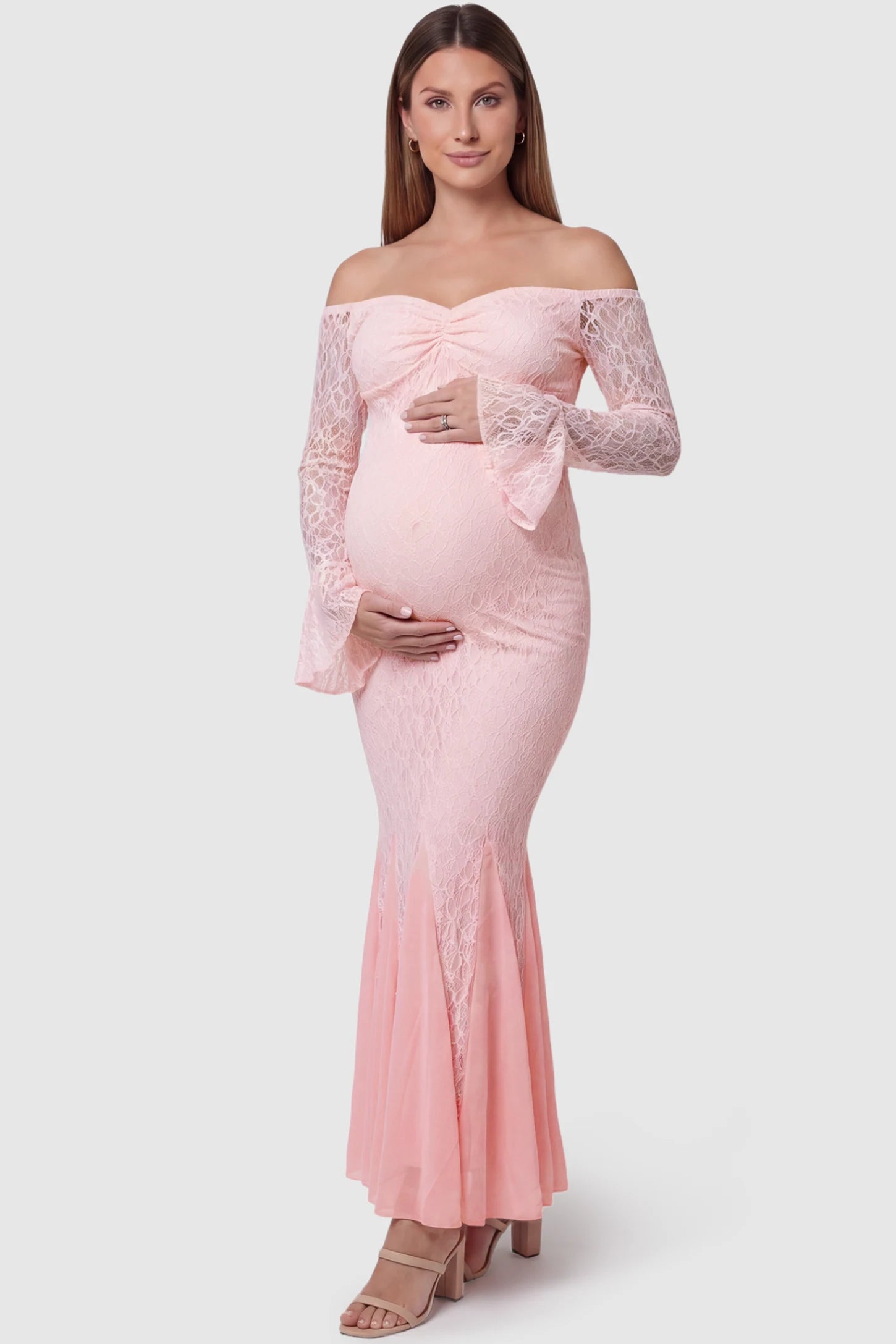 Lace Off Shoulder Mermaid Maternity Gown in pink lace featuring a sweetheart neckline, long sleeves, and a fitted mermaid silhouette on a pregnant model front view.
