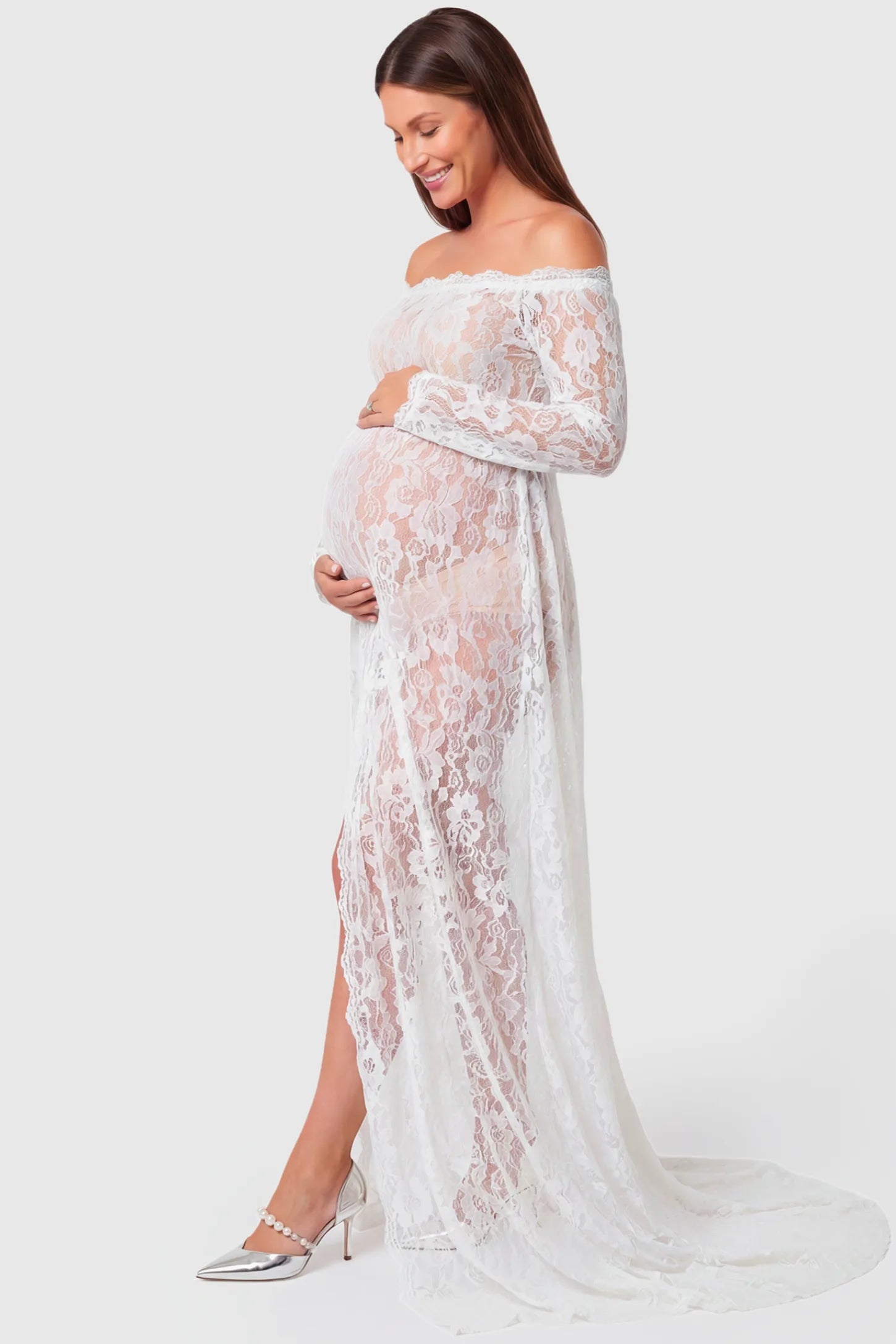 Lace Long Sleeve Maternity Gown Lace Long Sleeve Maternity Gown in white featuring off-shoulder scalloped lace trim neckline and sweep train on pregnant model.