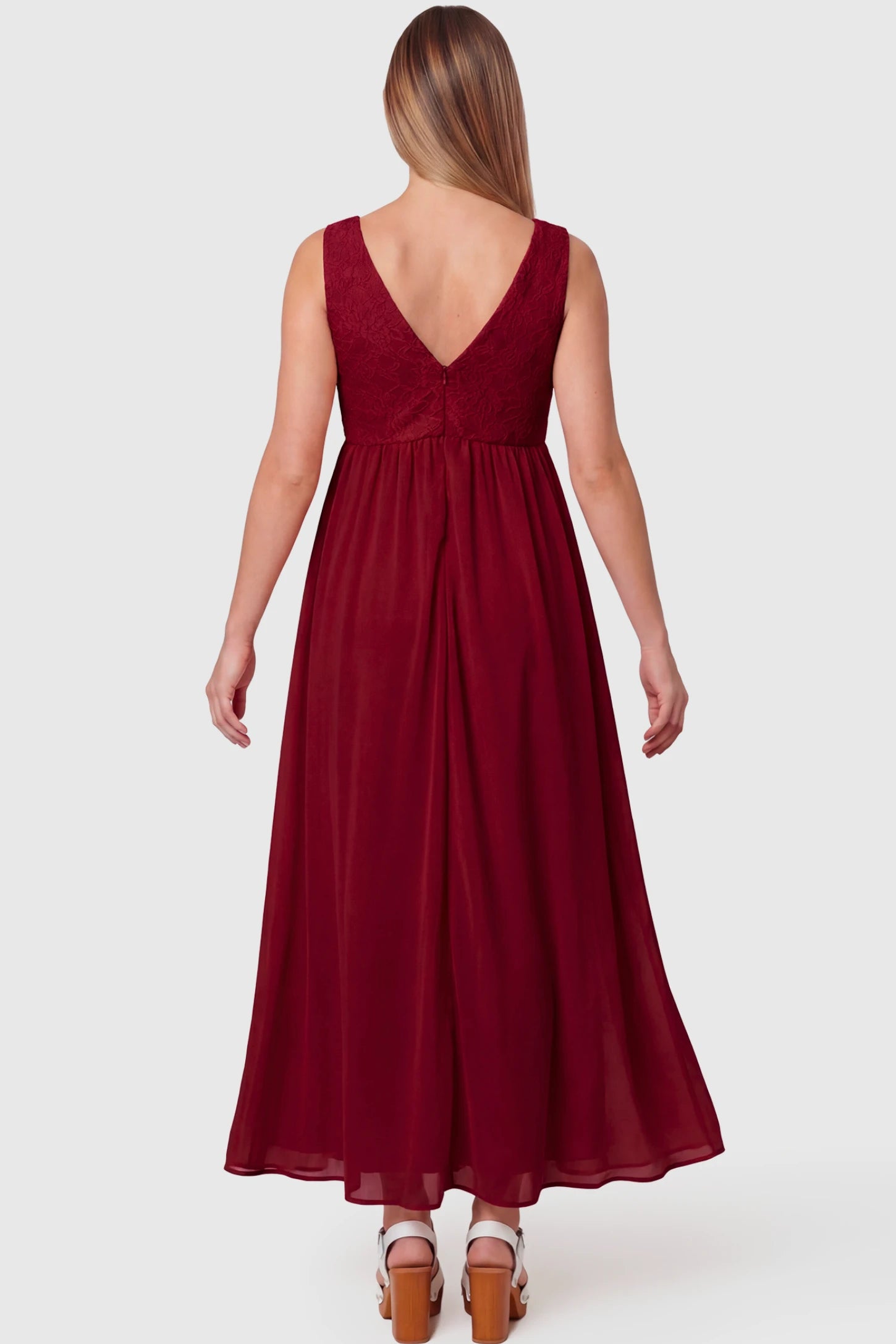 Lace Empire Waist Maternity Maxi Dress Lace Empire Waist Maternity Maxi Dress in wine red featuring V-back and flowing relaxed fit on pregnant model.