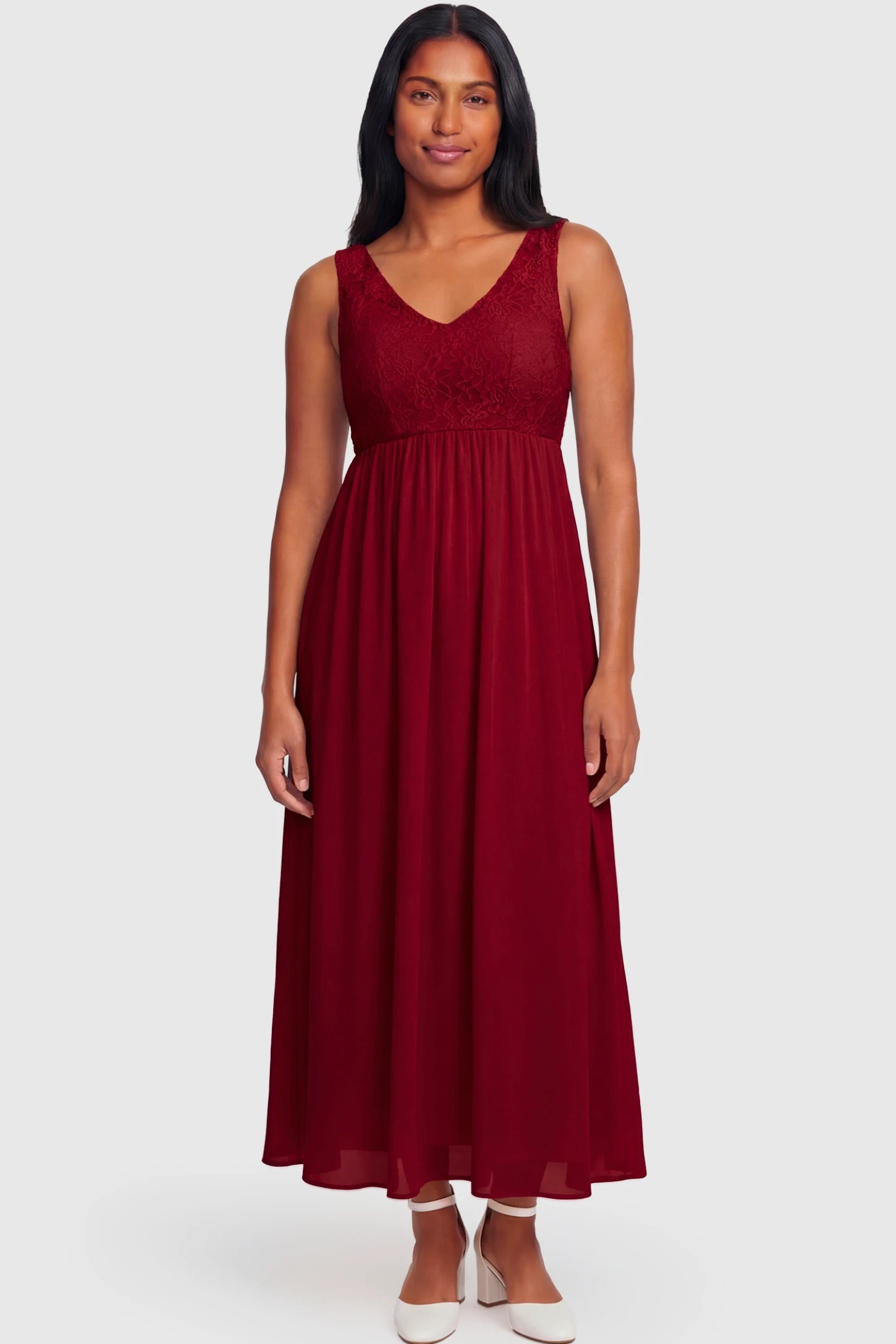 Lace Empire Waist Maternity Maxi Dress Lace Empire Waist Maternity Maxi Dress in wine red featuring V-neckline and flowing relaxed fit on a non pregnant model.
