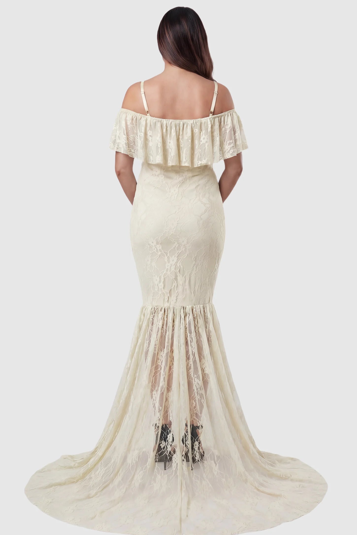 Lace Off-Shoulder Ruffle Short Sleeve Maternity Dress Lace off-shoulder maternity gown in apricot featuring ruffle neckline, mermaid silhouette, and extended lace train on pregnant model. back view