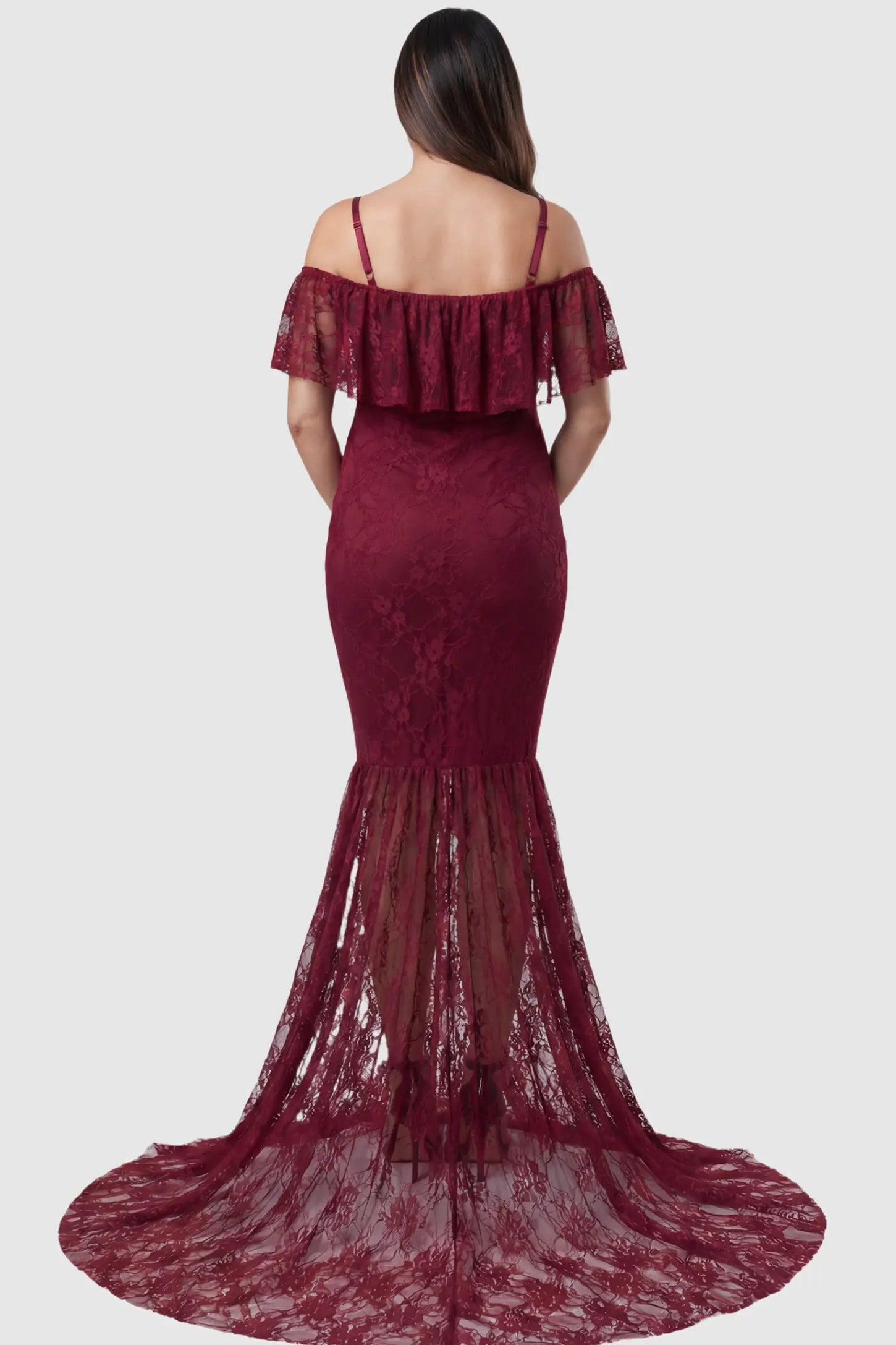 Lace Off-Shoulder Ruffle Short Sleeve Maternity Dress Lace off-shoulder maternity gown in burgundy featuring ruffle neckline, mermaid silhouette, and extended lace train on pregnant model. back view