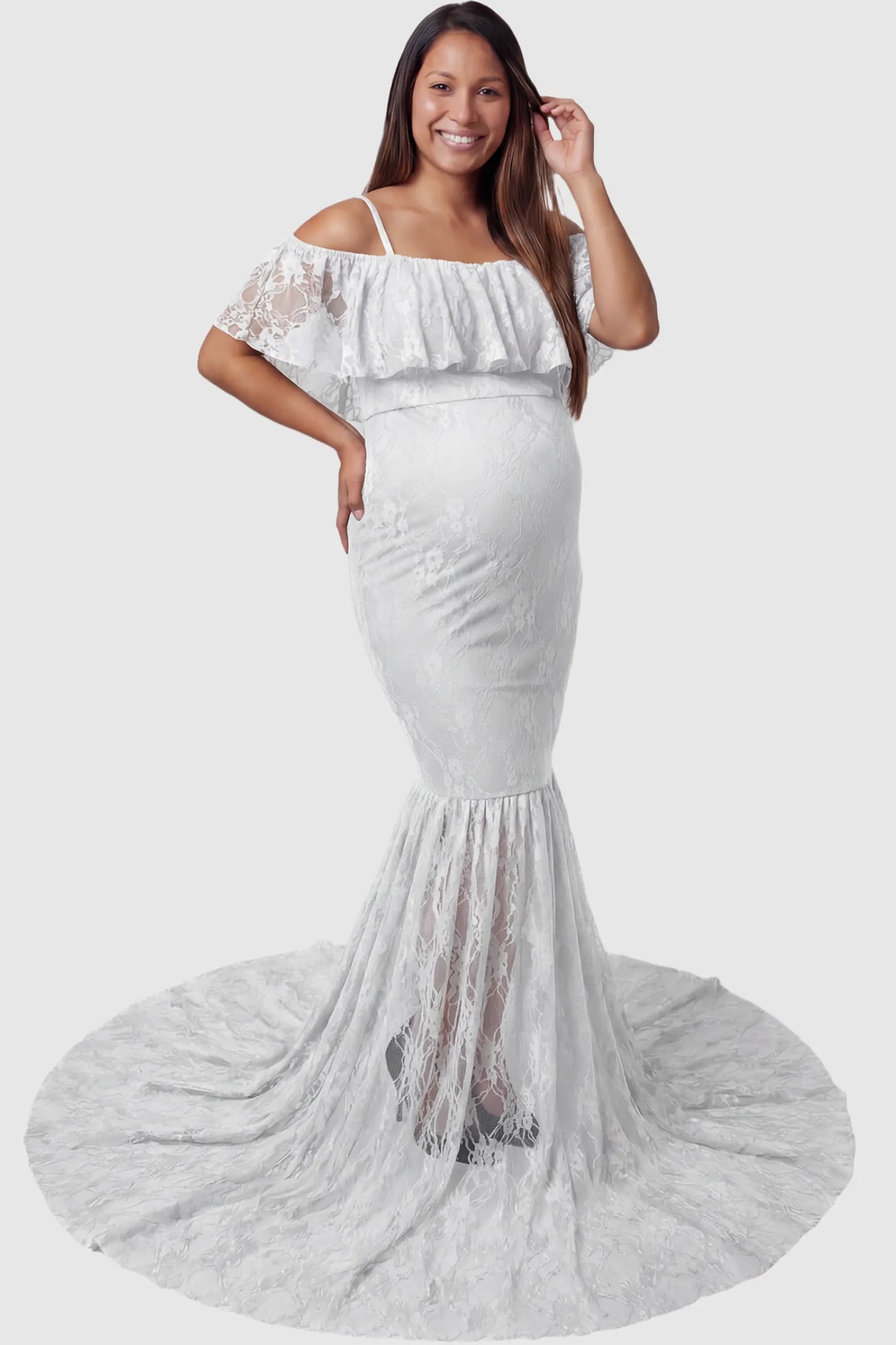 Lace Off-Shoulder Ruffle Short Sleeve Maternity Dress Lace off-shoulder maternity gown in white featuring ruffle neckline, mermaid silhouette, and extended lace train on pregnant model. front view