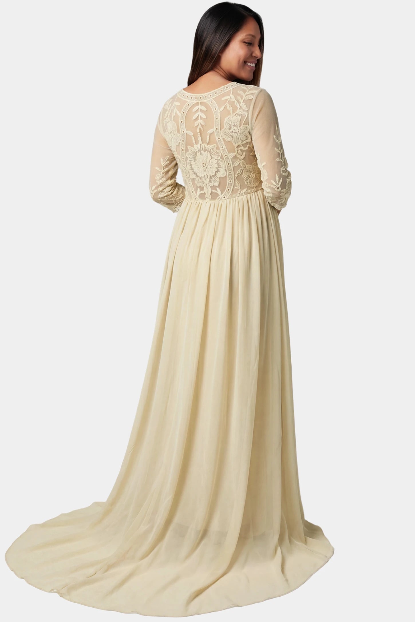 Lace Trim Long Sleeve Train Maxi Maternity Dress Lace trim half sleeve train maxi maternity dress in apricot featuring dramatic maternity train in back view on a pregnant model