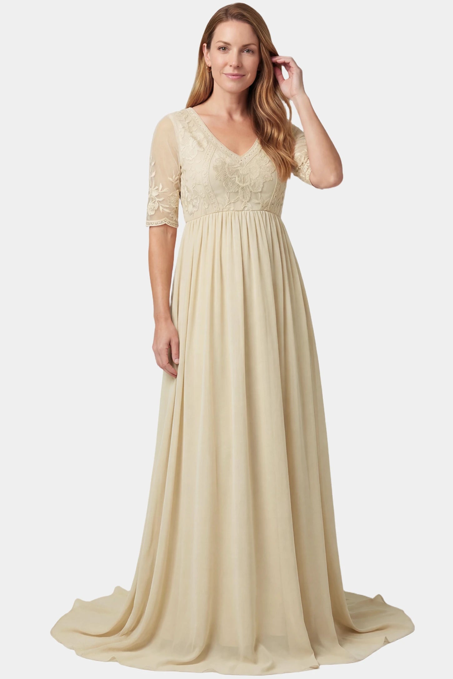 Lace Trim Long Sleeve Train Maxi Maternity Dress Lace trim half sleeve train maxi maternity dress in apricot featuring lace and mesh bodice in front view on a postpartum model