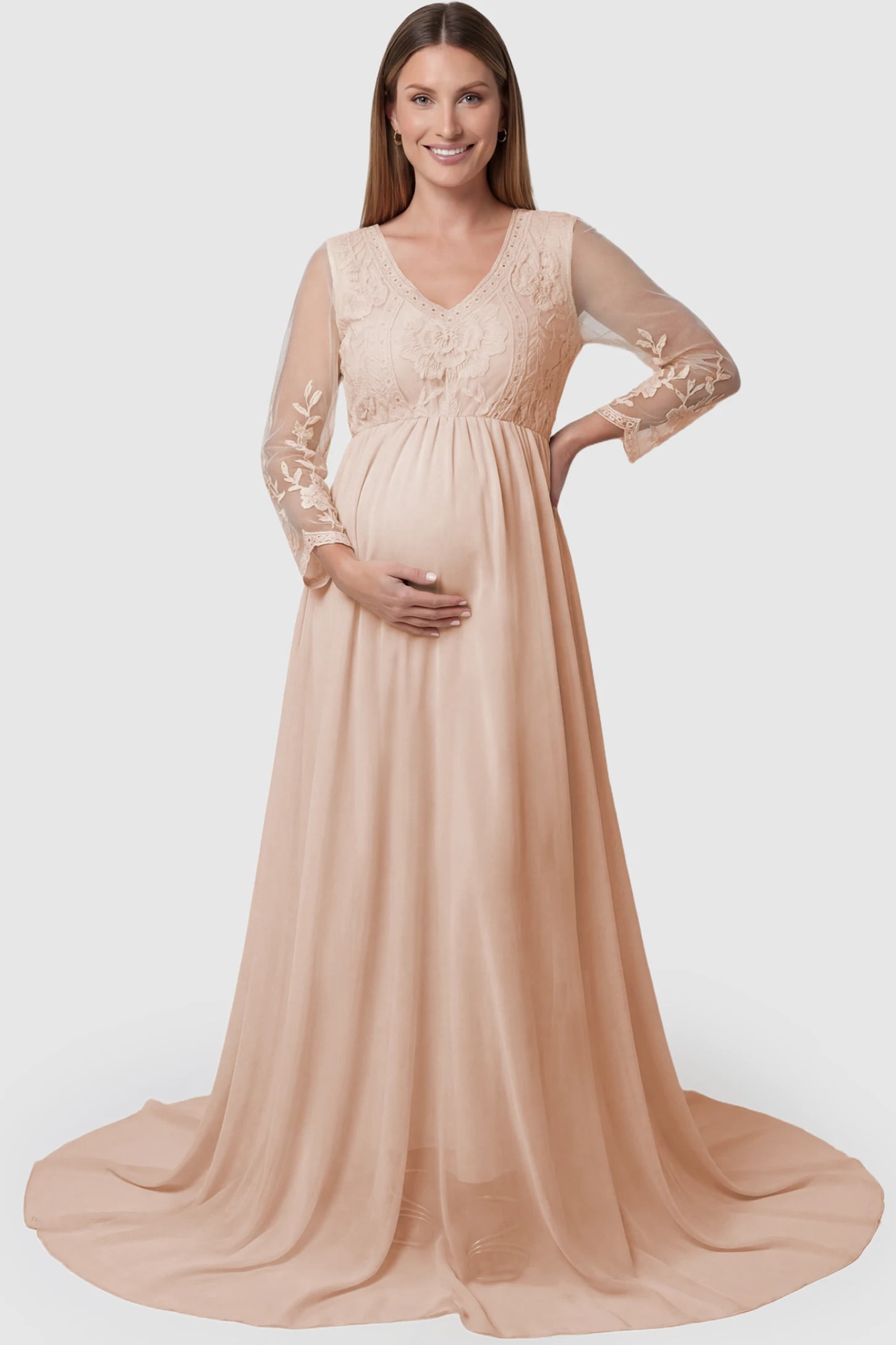 Lace Trim Long Sleeve Train Maternity Gown Lace trim long sleeve train maternity gown in pink with flowing train silhouette & mesh sleeves, front view on pregnant model
