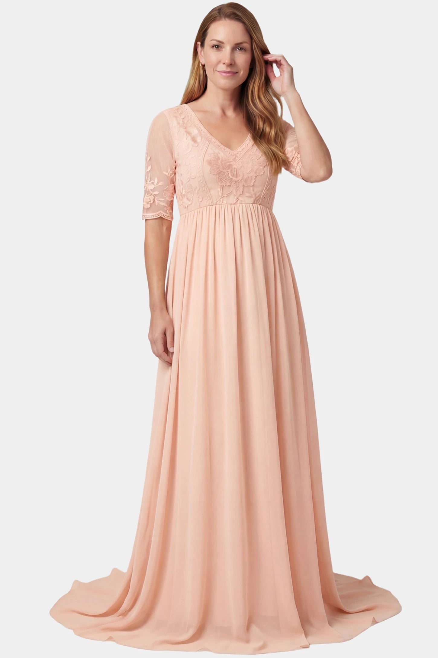 Lace Trim Long Sleeve Train Maxi Maternity Dress Lace trim half sleeve train maxi maternity dress in pink featuring lace and mesh bodice in front view on a postpartum model