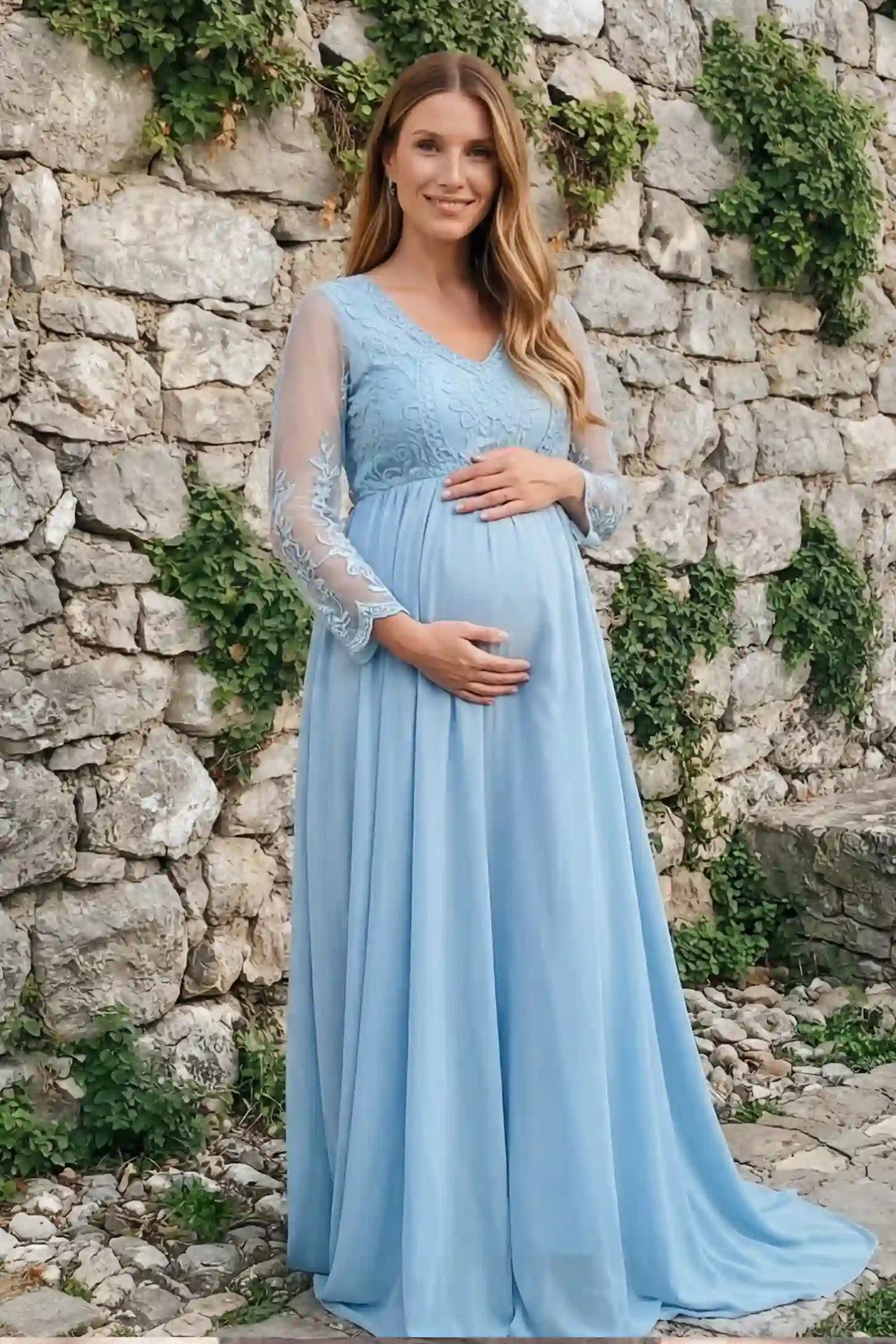 Lace Trim Long Sleeve Train Maternity Gown Lace trim long sleeve train maternity gown in sky blue with flowing train silhouette & mesh sleeves, front view on pregnant model