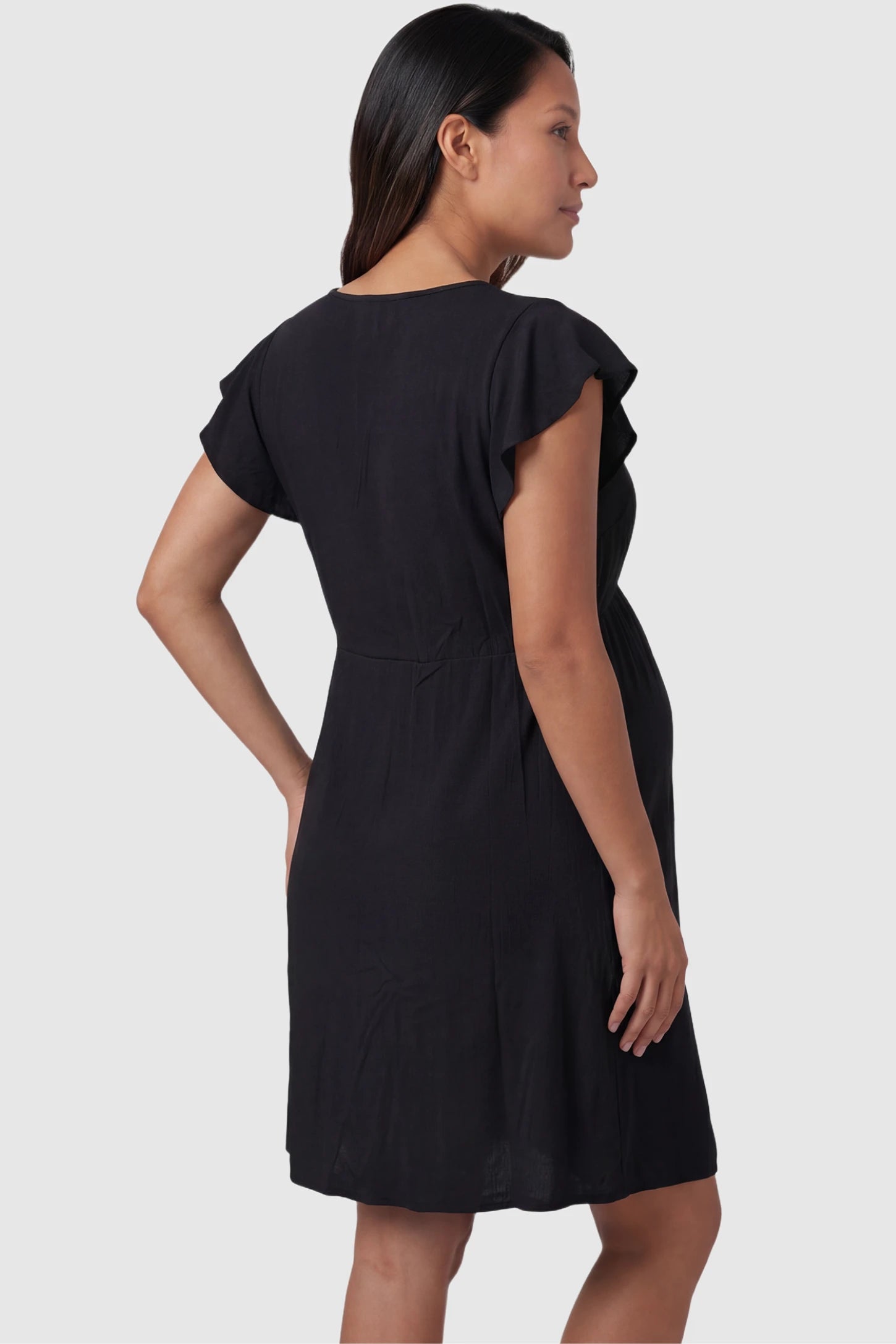 Lace Trim V-Neck Maternity & Nursing Sleep Dress Lace trim V-neck maternity nursing sleep dress in black with empire waist and relaxed A-line fit on pregnant model back view.
