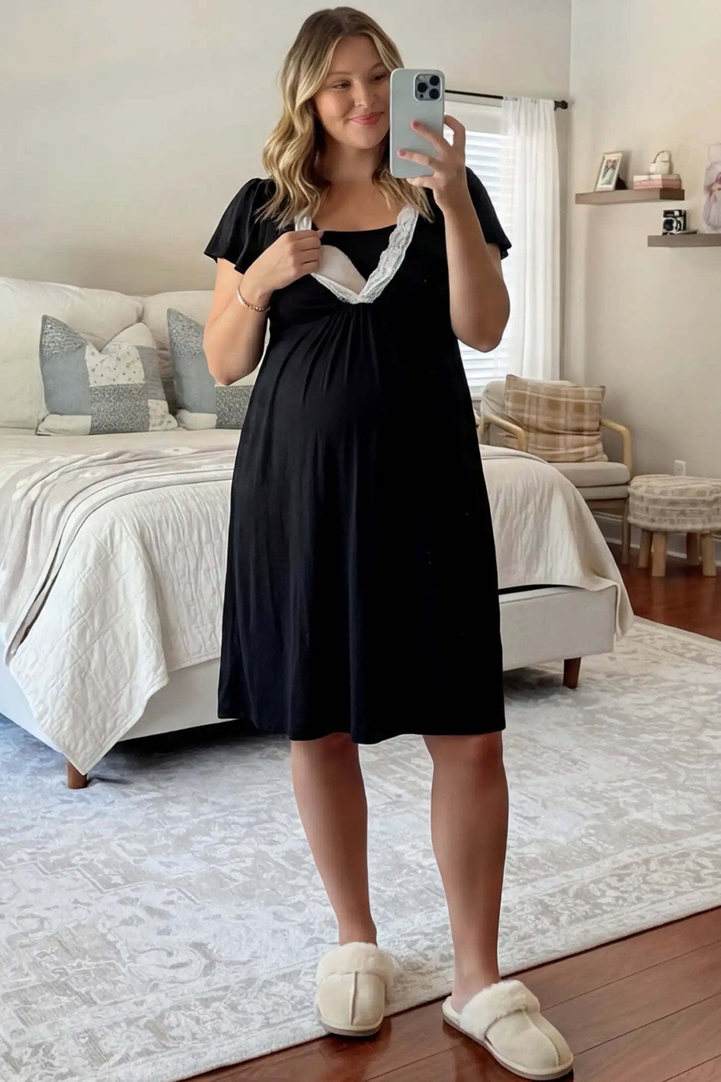 Lace Trim V-Neck Maternity & Nursing Sleep Dress Lace trim V-neck maternity nursing sleep dress in black with empire waist and relaxed A-line fit on pregnant model front view.