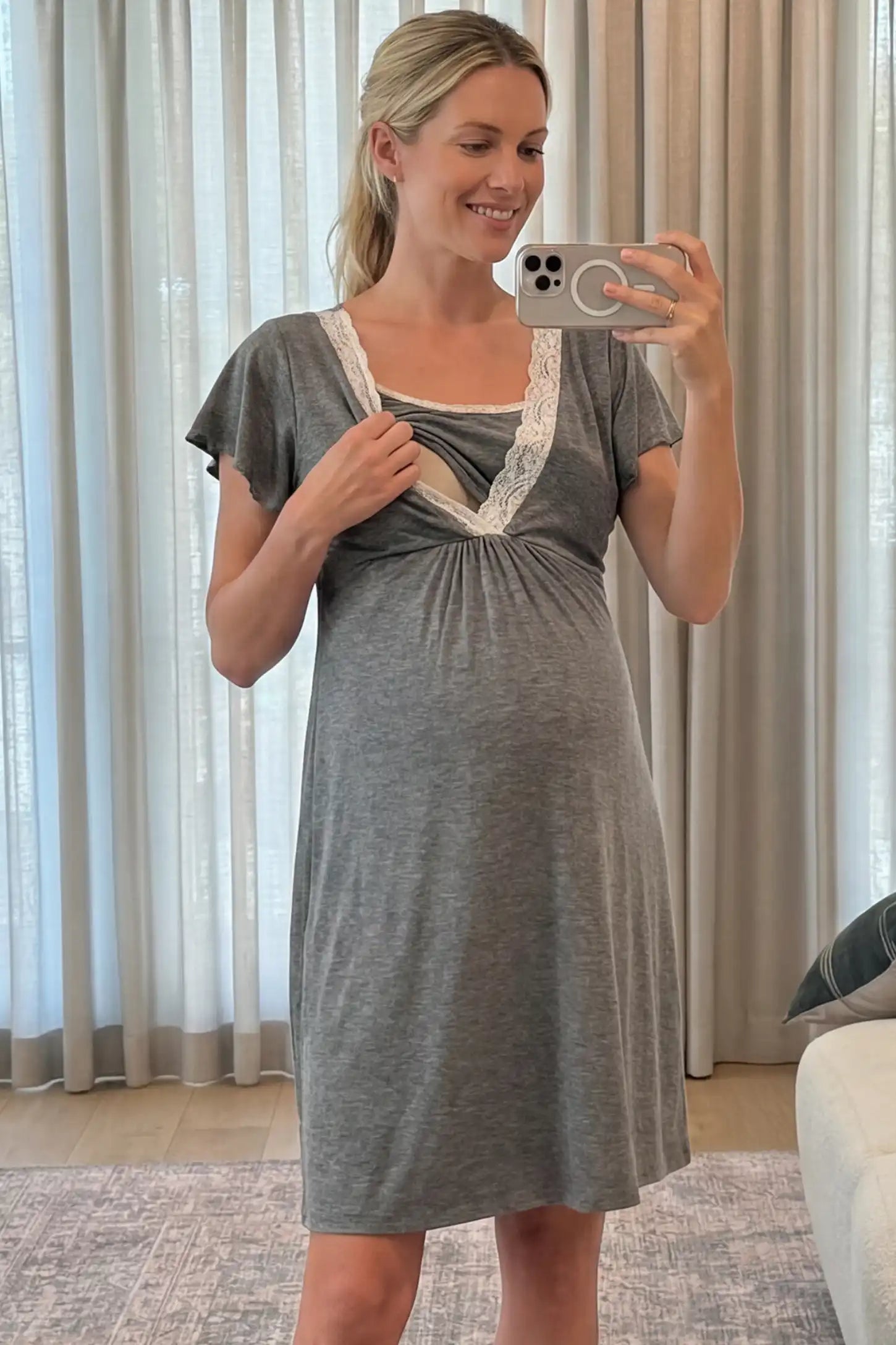 Lace Trim V-Neck Maternity & Nursing Sleep Dress Lace trim V-neck maternity nursing sleep dress in dark gray with empire waist and relaxed A-line fit on pregnant model front view.