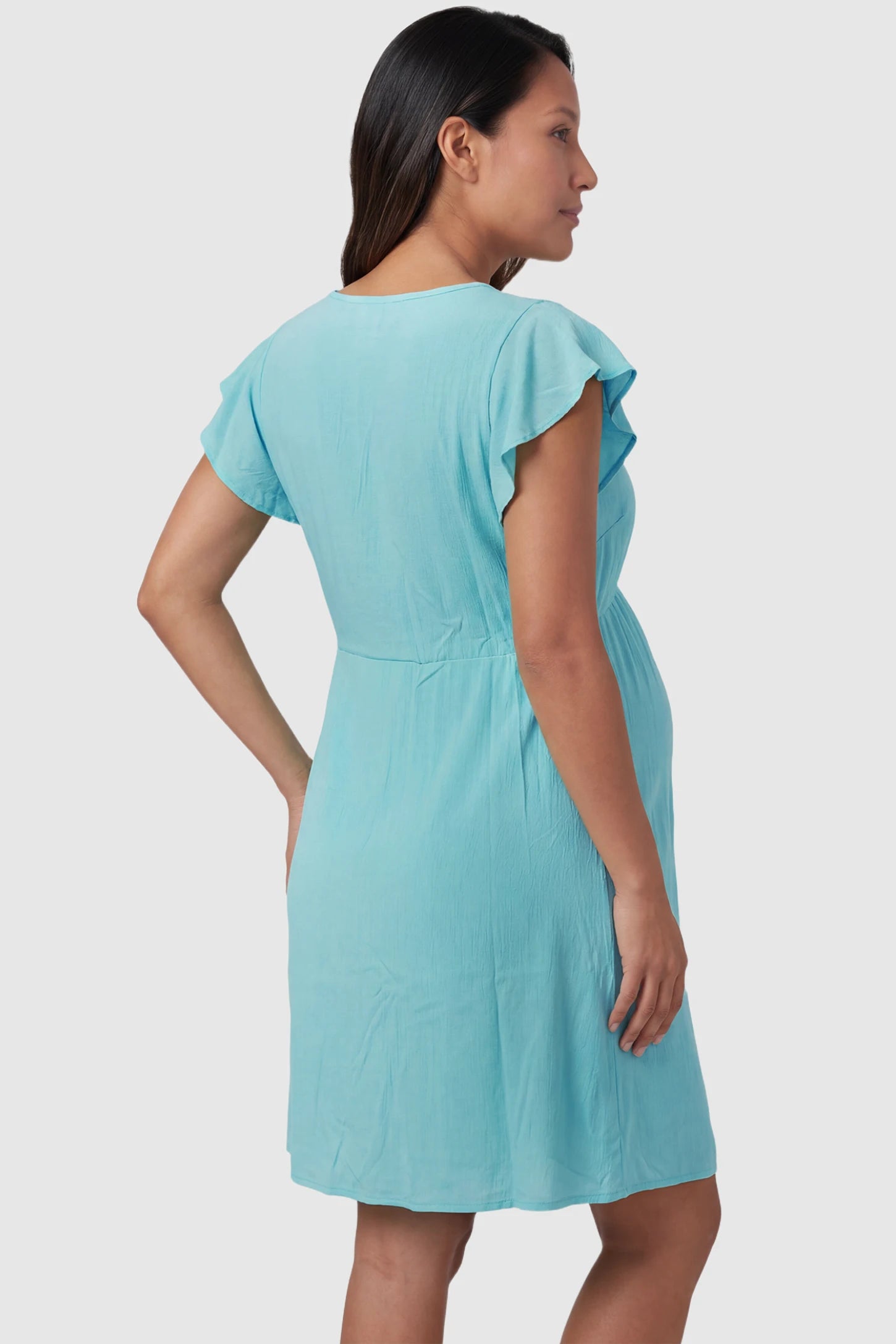 Lace Trim V-Neck Maternity & Nursing Sleep Dress Lace trim V-neck maternity nursing sleep dress in light blue with empire waist and relaxed A-line fit on pregnant model back view.