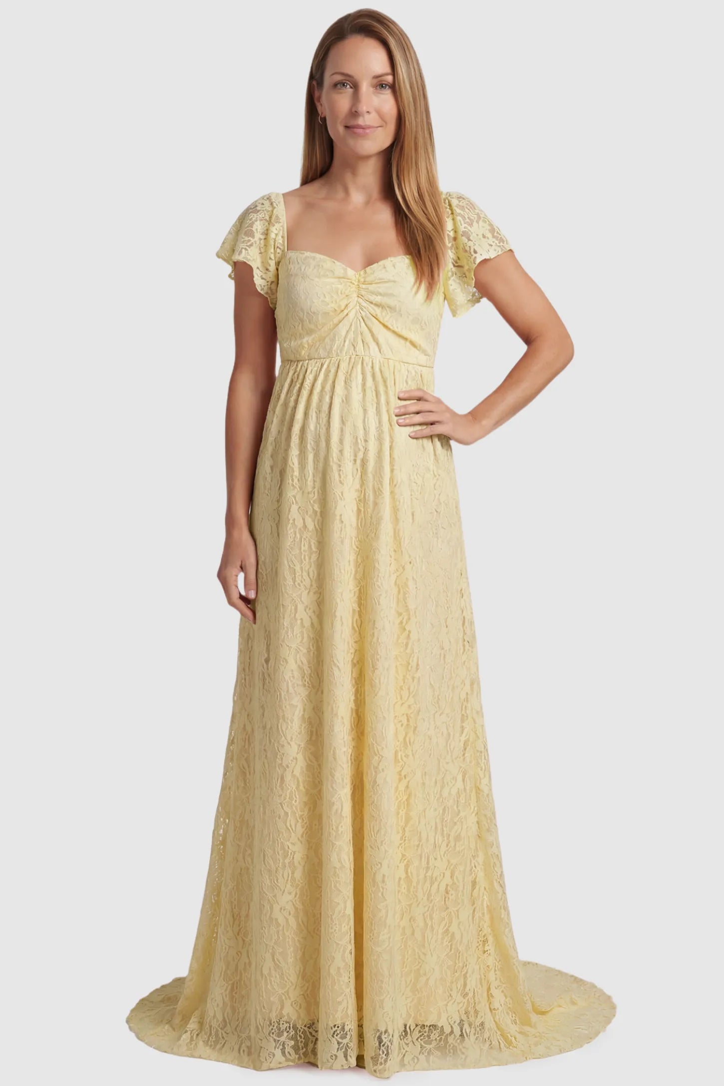 Lace Off Shoulder Maternity Maxi Dress Lace Off Shoulder Maternity Maxi Dress in apricot featuring a sweetheart neckline with a ruched bust and a full-length skirt, shown on a postpartum model, front view.