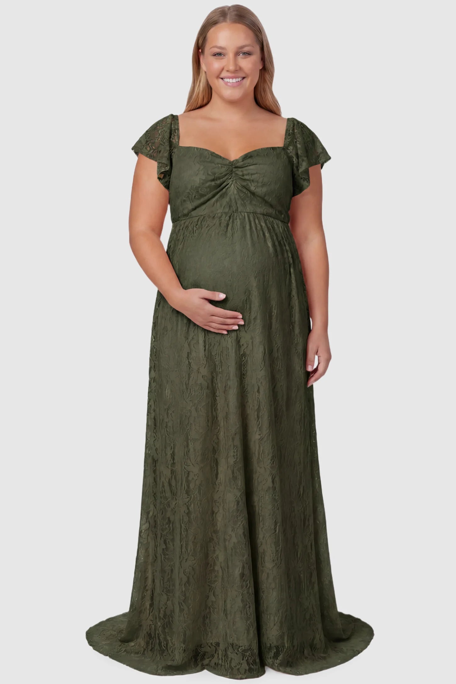 Lace Off Shoulder Maternity Maxi Dress Lace Off Shoulder Maternity Maxi Dress in army green featuring a sweetheart neckline with a ruched bust and a full-length skirt, shown on a plus size pregnant model, front view.