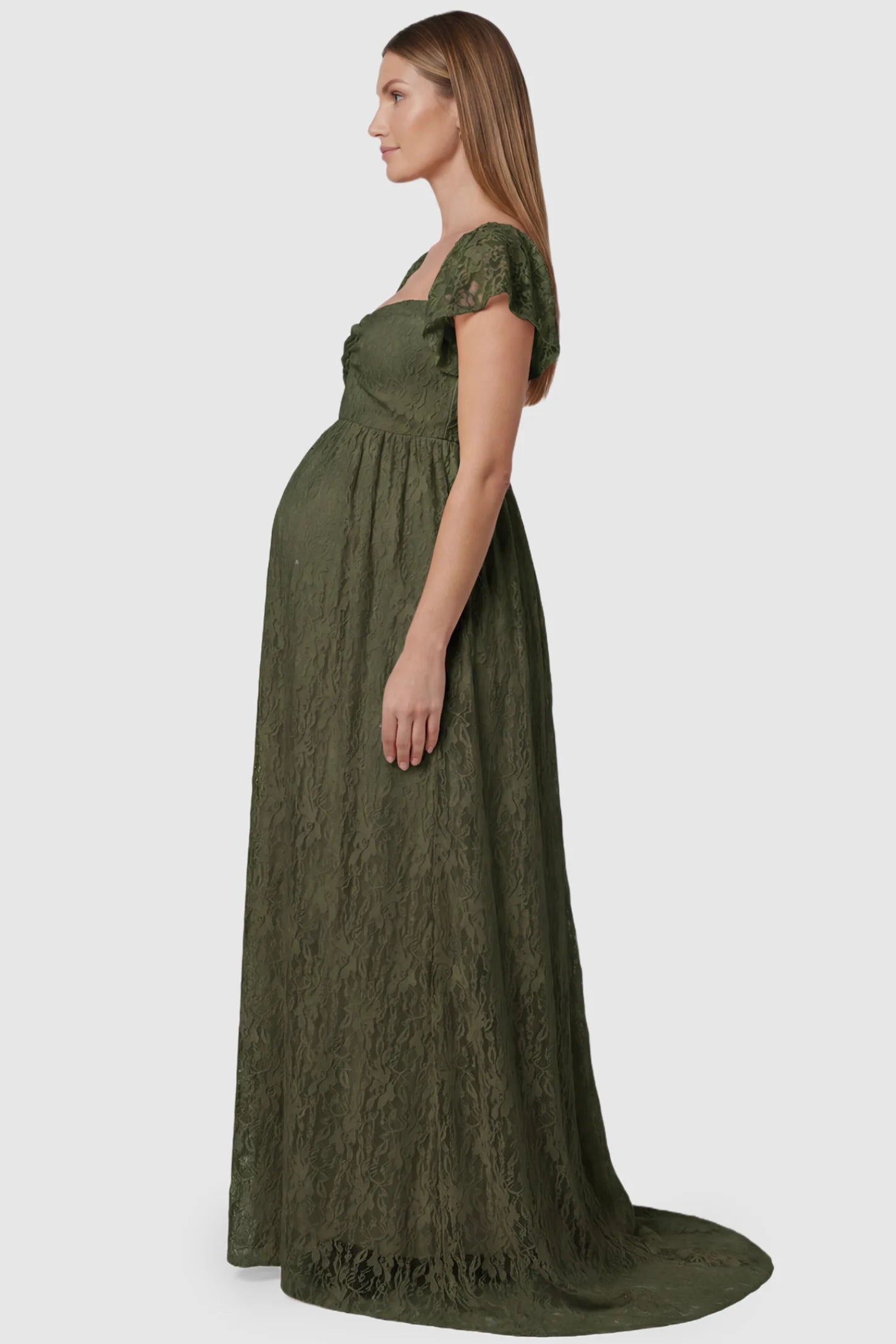 Lace Off Shoulder Maternity Maxi Dress Lace Off Shoulder Maternity Maxi Dress in army green featuring a sweetheart neckline with a ruched bust and a full-length skirt, shown on a pregnant model, side view.