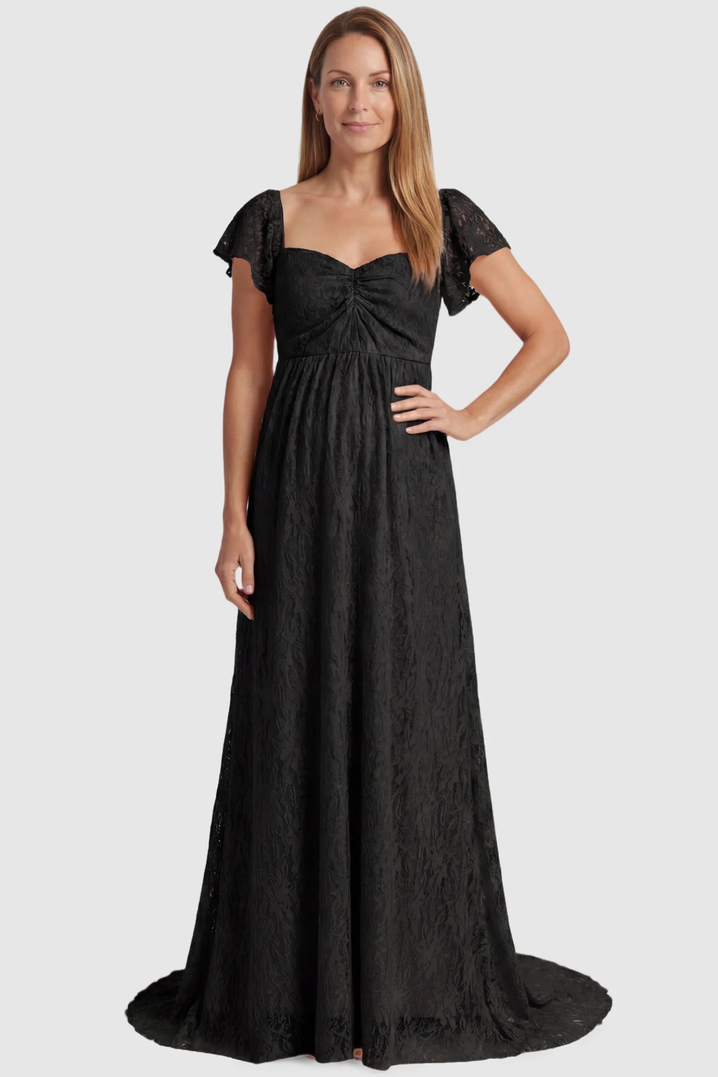 Lace Off Shoulder Maternity Maxi Dress Lace Off Shoulder Maternity Maxi Dress in black featuring a sweetheart neckline with a ruched bust and a full-length skirt, shown on a postpartum model, front view.