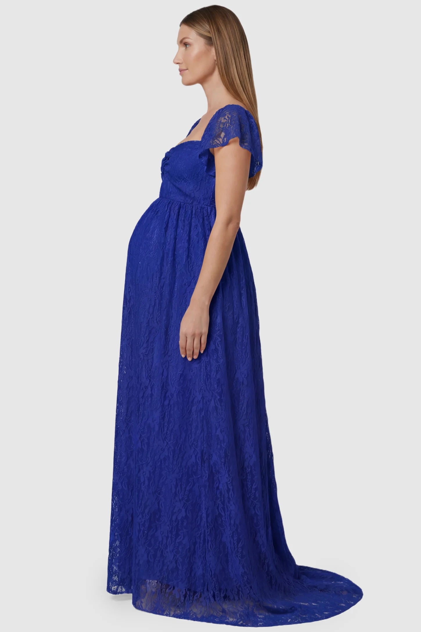 Lace Off Shoulder Maternity Maxi Dress Lace Off Shoulder Maternity Maxi Dress in blue featuring a sweetheart neckline with a ruched bust and a full-length skirt, shown on a pregnant model, side view.
