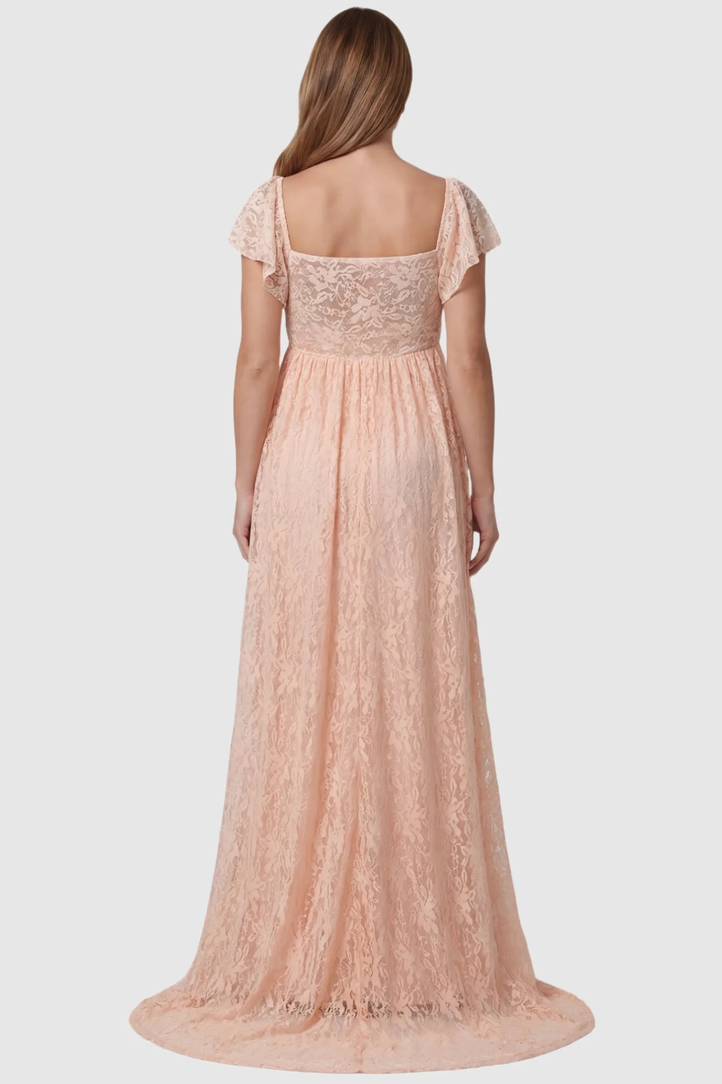 Lace Off Shoulder Maternity Maxi Dress Lace Off Shoulder Maternity Maxi Dress in blush pink featuring full-length skirt, shown on a pregnant model, back view.