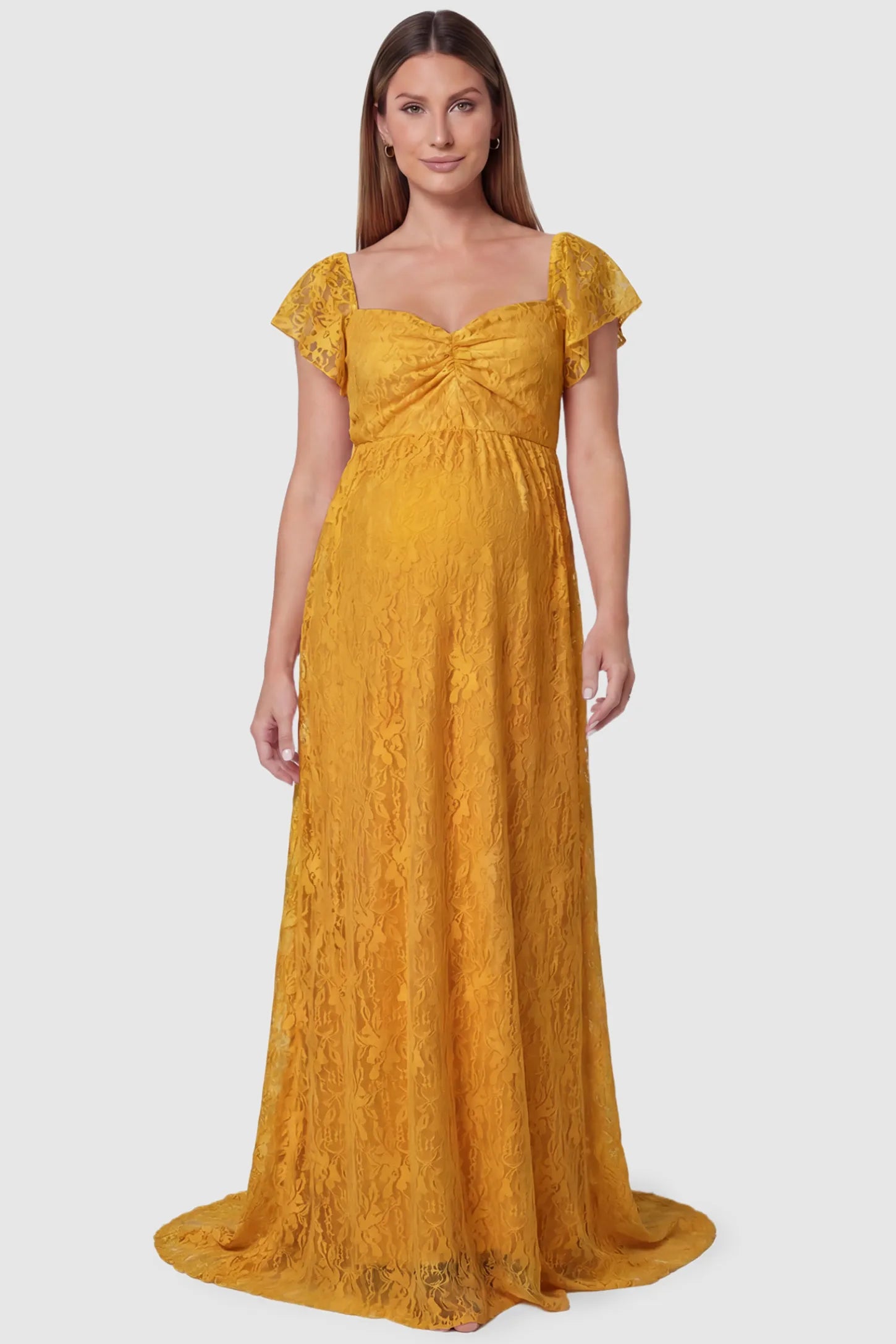 Lace Off Shoulder Maternity Maxi Dress Lace Off Shoulder Maternity Maxi Dress in gold featuring a sweetheart neckline with a ruched bust and a full-length skirt, shown on a pregnant model, front view.