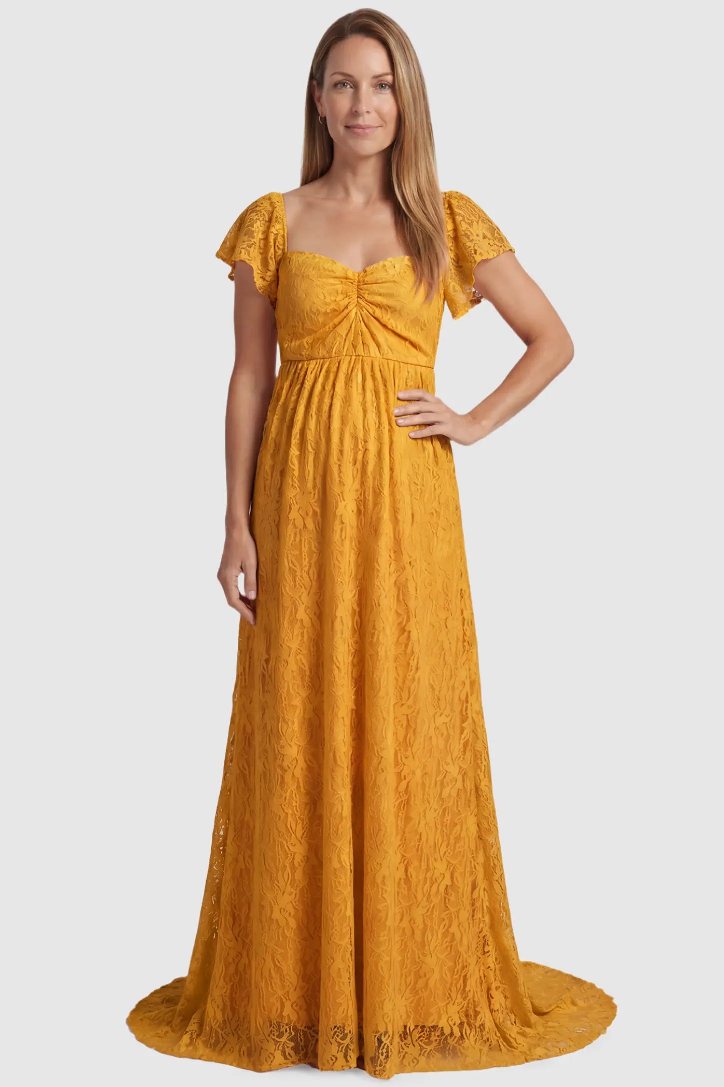 Lace Off Shoulder Maternity Maxi Dress Lace Off Shoulder Maternity Maxi Dress in gold featuring a sweetheart neckline with a ruched bust and a full-length skirt, shown on a postpartum model, front view.