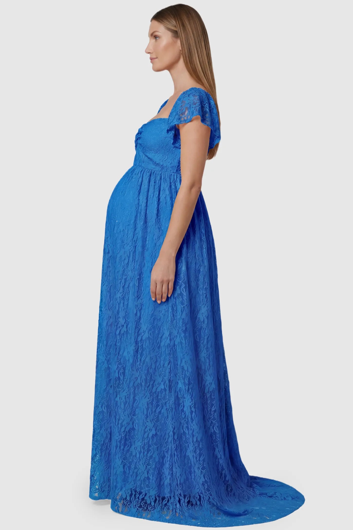 Lace Off Shoulder Maternity Maxi Dress Lace Off Shoulder Maternity Maxi Dress in ocean blue featuring a sweetheart neckline with a ruched bust and a full-length skirt, shown on a pregnant model, side view.