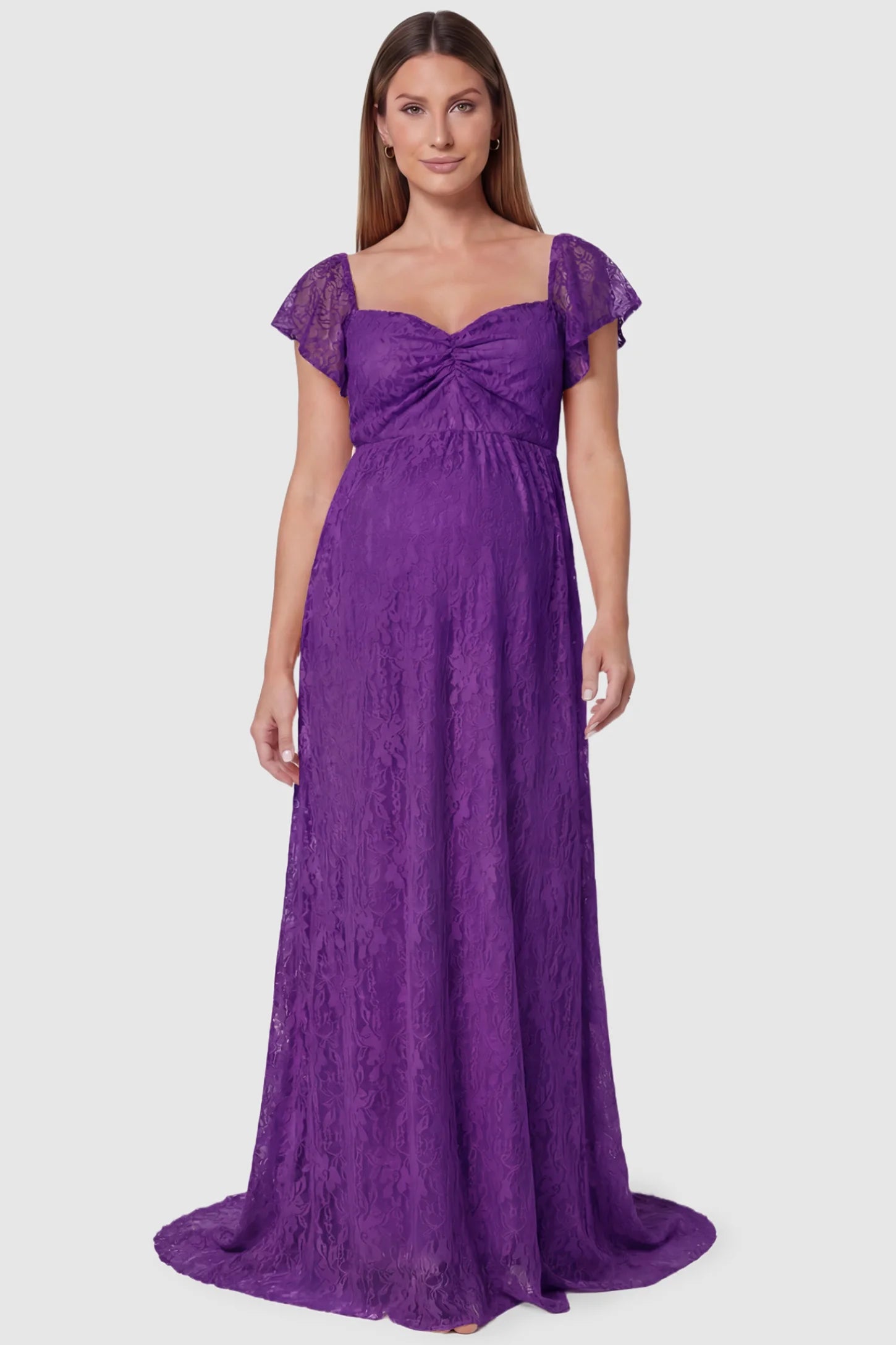 Lace Off Shoulder Maternity Maxi Dress Lace Off Shoulder Maternity Maxi Dress in purple featuring a sweetheart neckline with a ruched bust and a full-length skirt, shown on a pregnant model, front view.