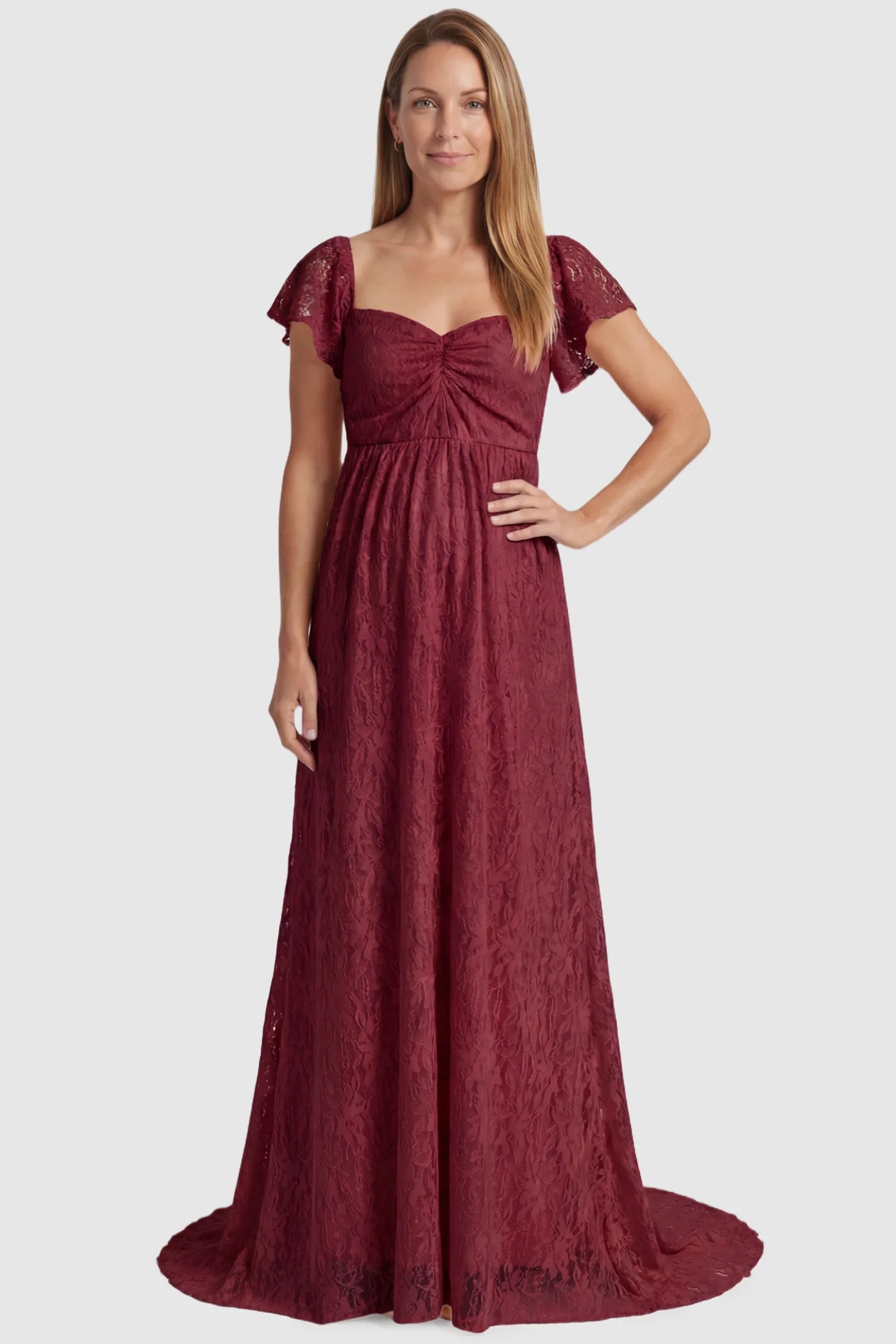 Lace Off Shoulder Maternity Maxi Dress Lace Off Shoulder Maternity Maxi Dress in wine red featuring a sweetheart neckline with a ruched bust and a full-length skirt, shown on a postpartum model, front view.