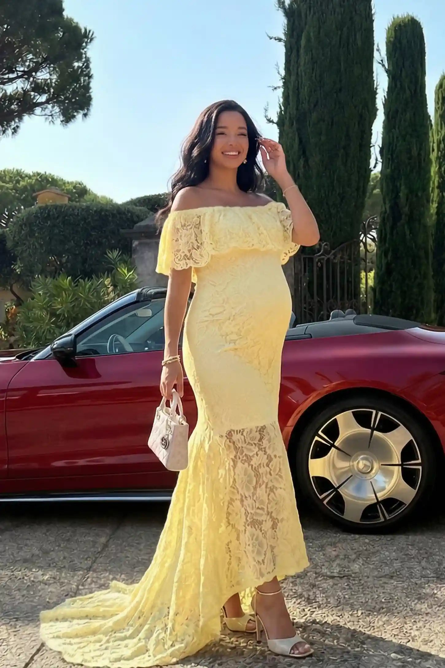 Lace Off-the-Shoulder Flutter Sleeve Maternity Maxi Dress Lace Off-the-Shoulder Flutter Sleeve Maternity Dress in Beige featuring an elegant side-profile view on a pregnant model.