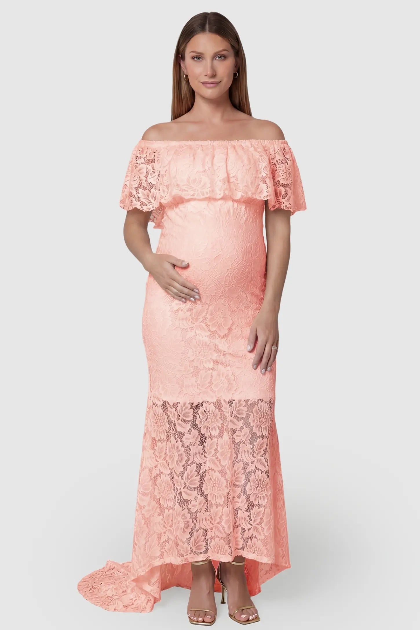 Lace Off-the-Shoulder Flutter Sleeve Maternity Maxi Dress Lace Off-the-Shoulder Flutter Sleeve Maternity Dress in Pink featuring a soft floral lace pattern on a front-facing pregnant model.
