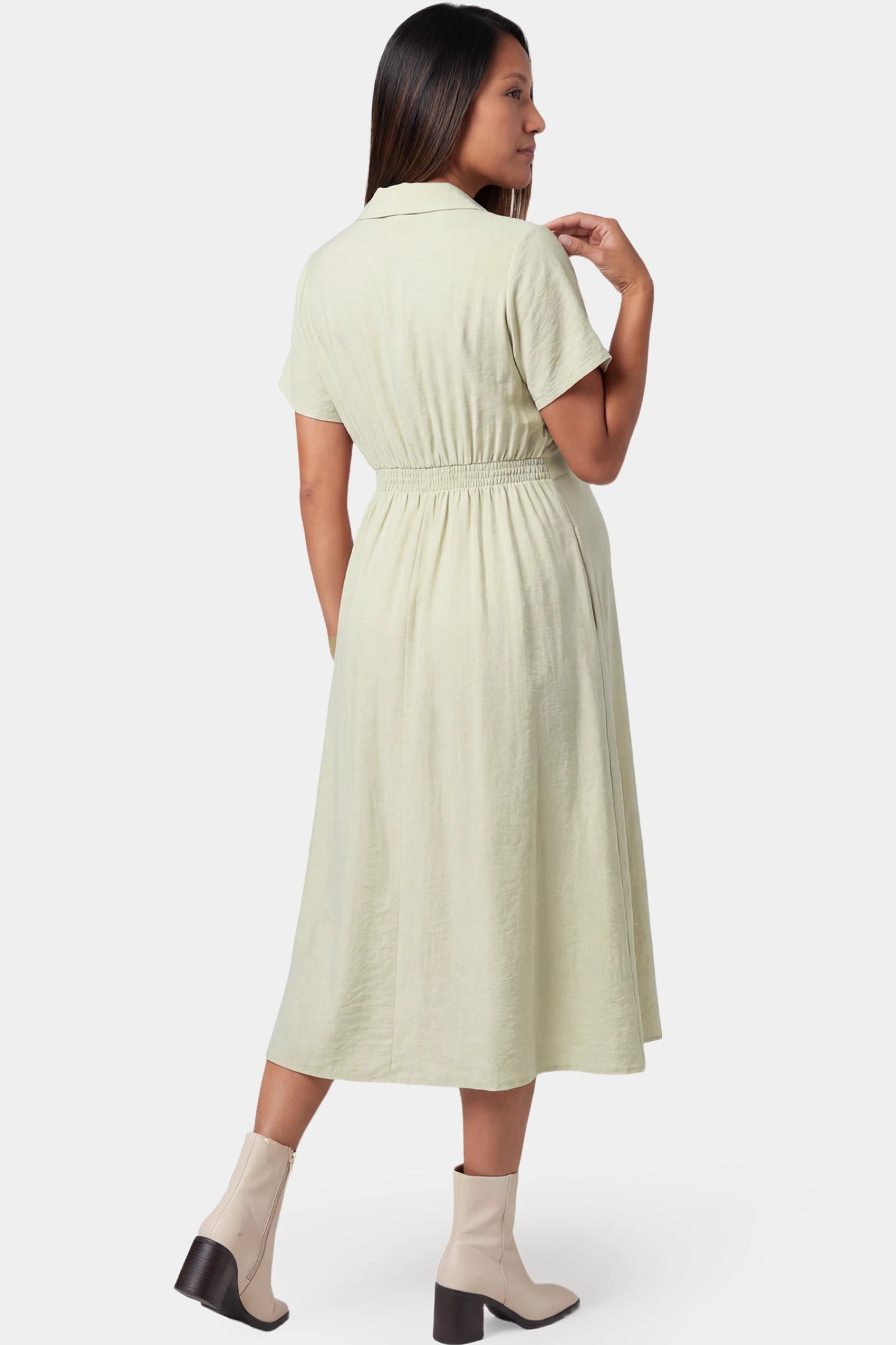 Lapel Collar Short Sleeve A-Line Midi Maternity Dress Lapel collar short sleeve A-line midi maternity dress in light green featuring high waisted silhouette in full body back view on a pregnant model