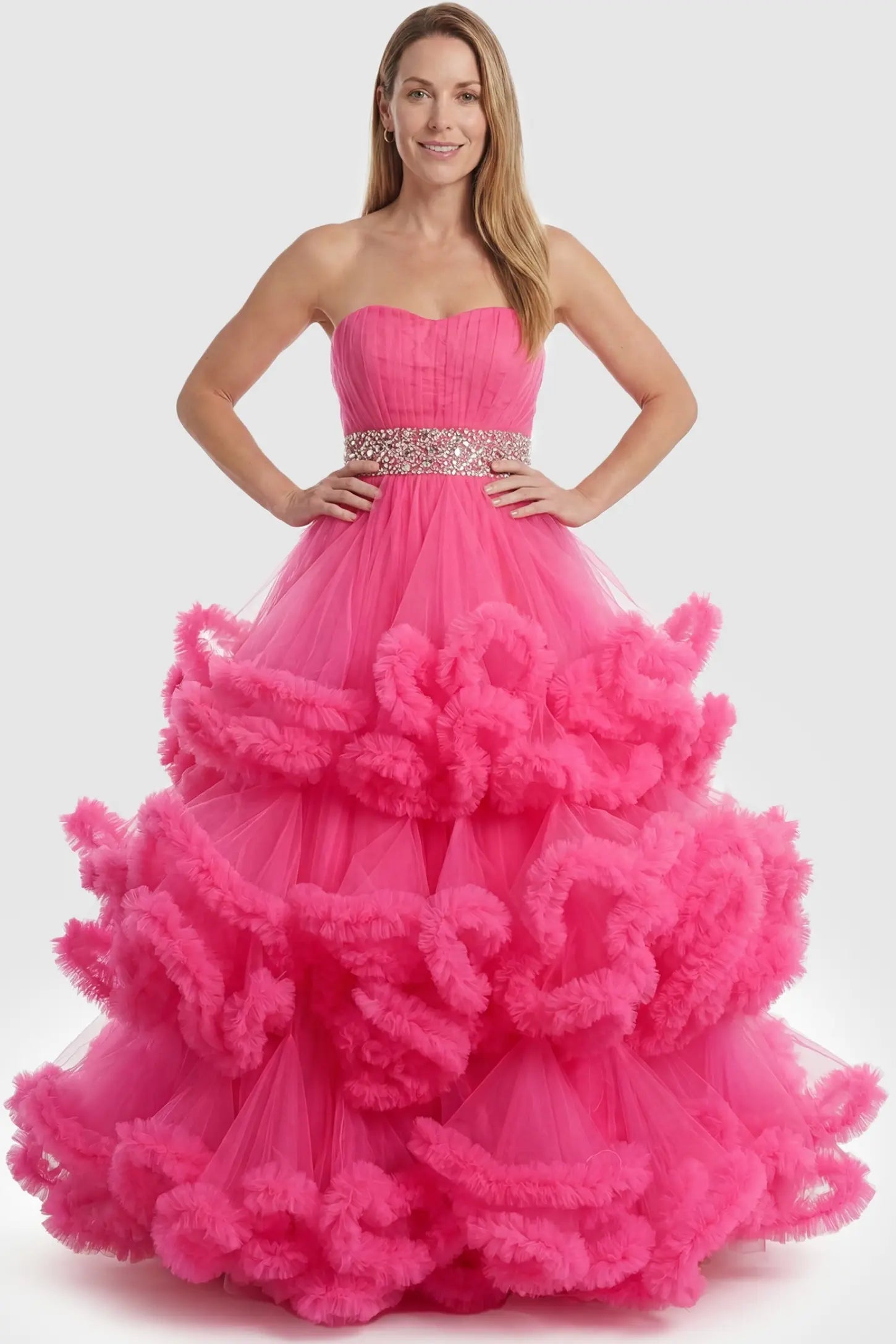 Multi-Layered Pleated Tulle Strapless Bodice Maxi Maternity Gown Multi-layered pleated tulle strapless bodice maxi maternity gown in rose red featuring sleeveless layered pleated tulle skirt in full body view on a postpartum model