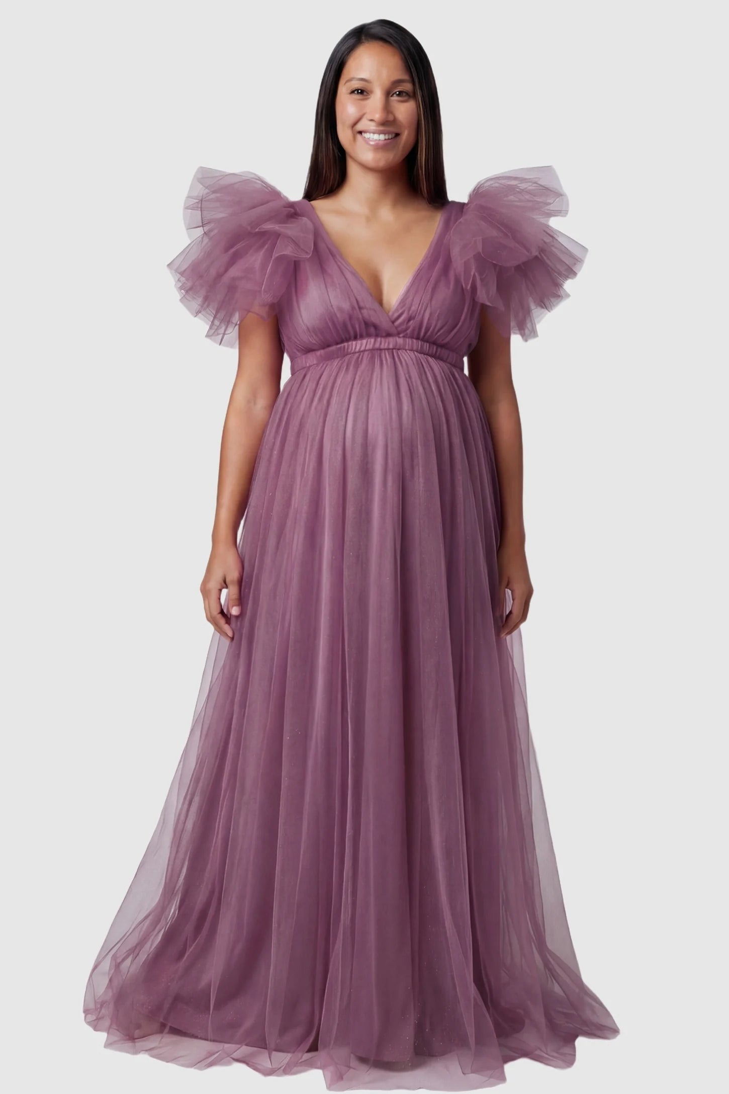 Layered Tulle Ruffle Sleeve Maternity Photoshoot Dress Layered Tulle Ruffle Sleeve Maternity Photoshoot Dress in Mauve featuring a tiered mesh front on a pregnant model.