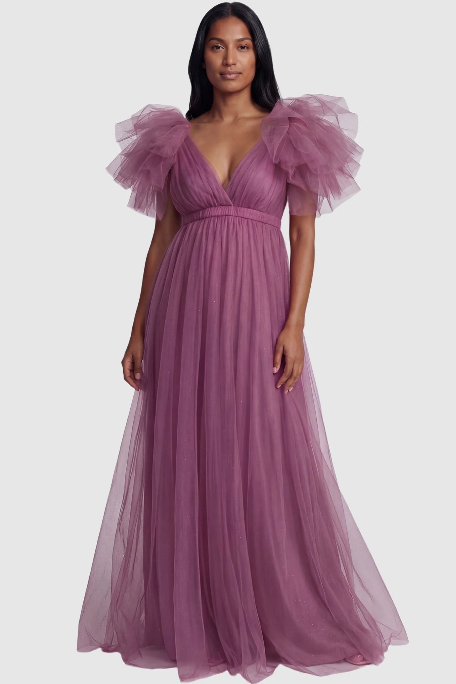 Layered Tulle Ruffle Sleeve Maternity Photoshoot Dress Layered Tulle Ruffle Sleeve Maternity Photoshoot Dress in Mauve featuring an empire waist on a non-pregnant model.