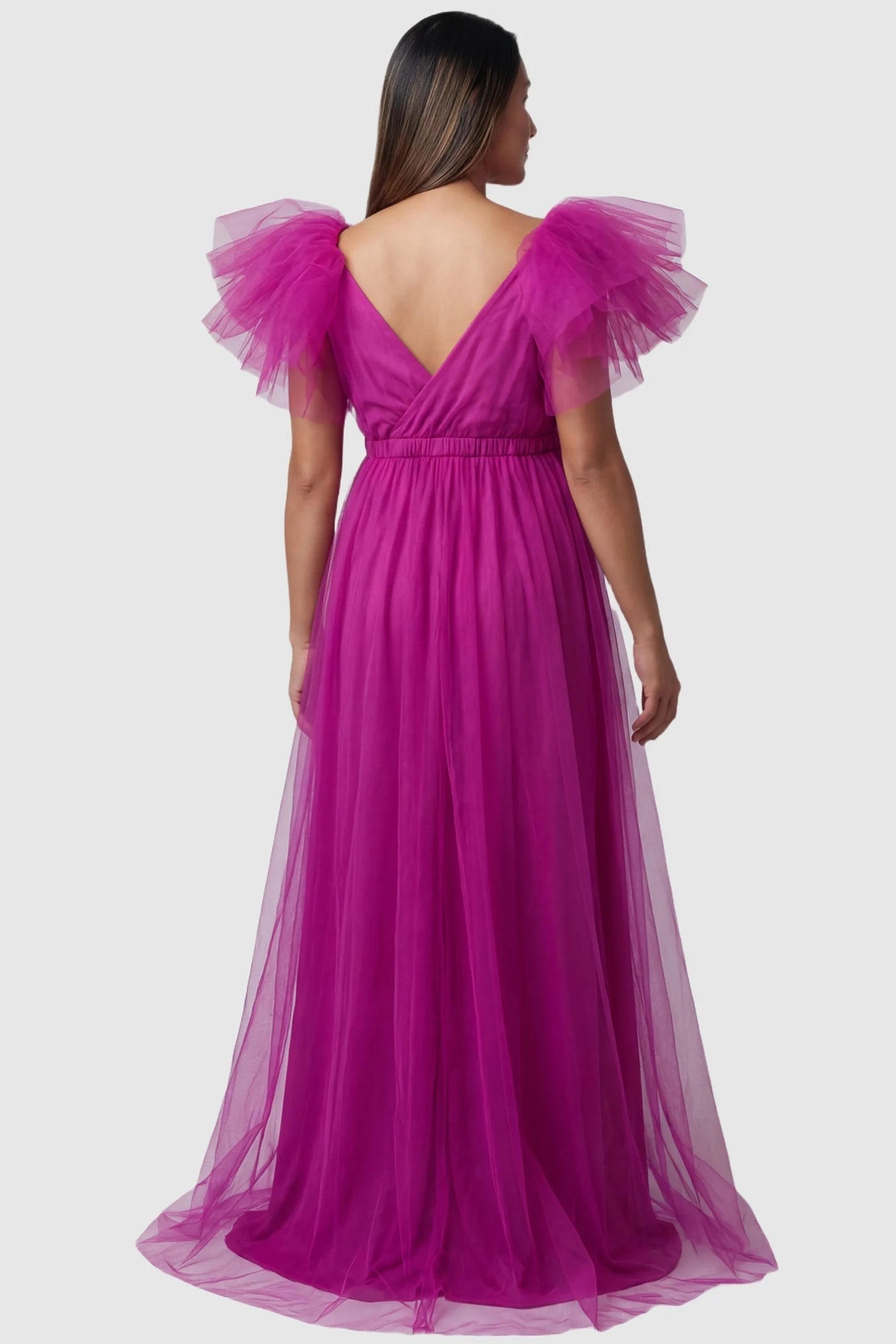 Layered Tulle Ruffle Sleeve Maternity Photoshoot Dress Layered Tulle Ruffle Sleeve Maternity Photoshoot Dress in Rose Red featuring a deep V-back on a pregnant model.