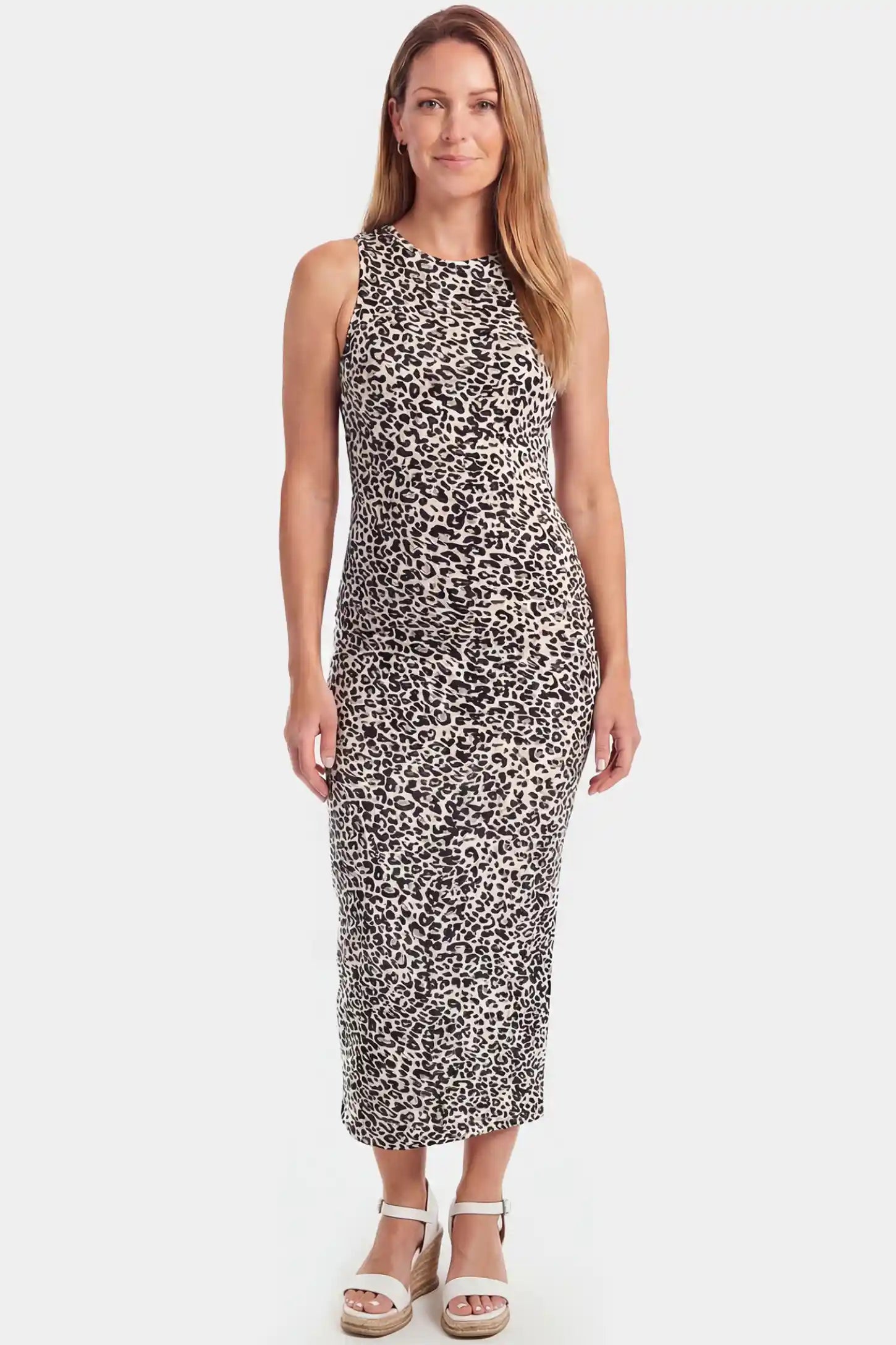 Leopard Print Sleeveless Bodycon Maxi Maternity Dress Leopard print sleeveless bodycon maxi maternity dress in light colorways featuring bold animal print in front view on a postpartum model