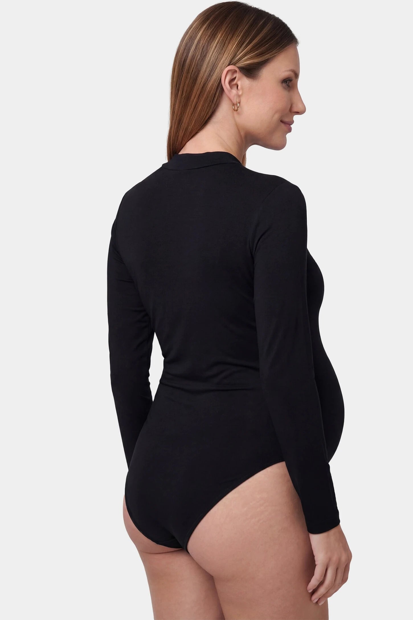 Sheer Mesh Long Sleeve Bodycon Maternity Photography Bodysuit Sheer mesh long sleeve bodycon maternity photography bodysuit in black featuring high stretch fabric on a pregnant model