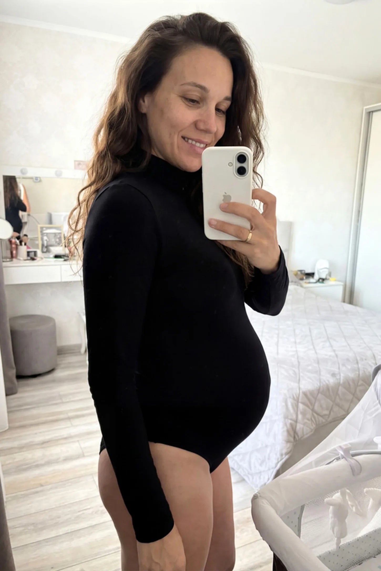 Sheer Mesh Long Sleeve Bodycon Maternity Photography Bodysuit Sheer mesh long sleeve bodycon maternity photography bodysuit in black featuring high stretch fabric on a pregnant model