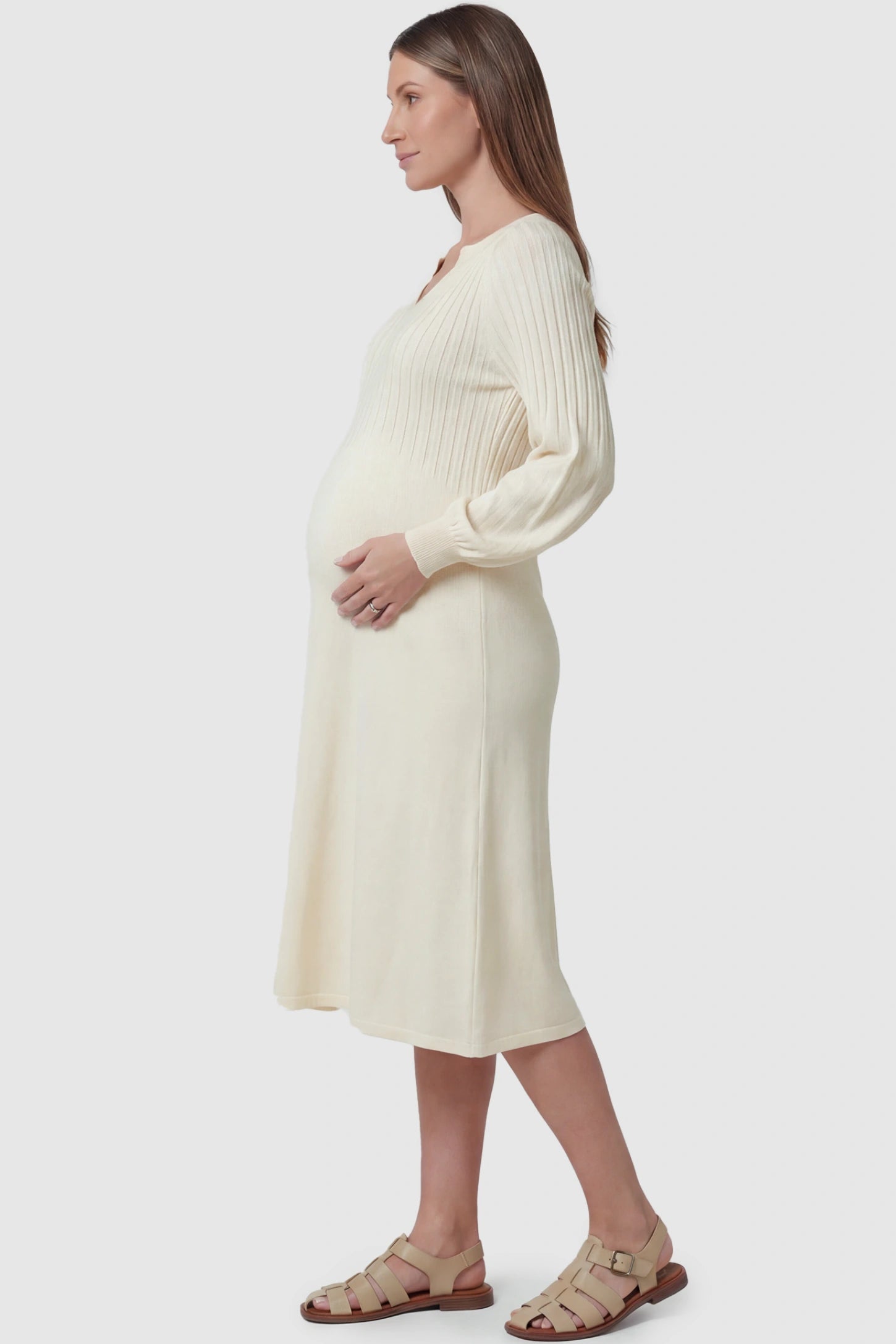 Notched Neck Long Sleeve Maternity Midi Dress Sweetheart neck long sleeve maternity midi dress in apricot with elegant long sleeves, side view on pregnant model