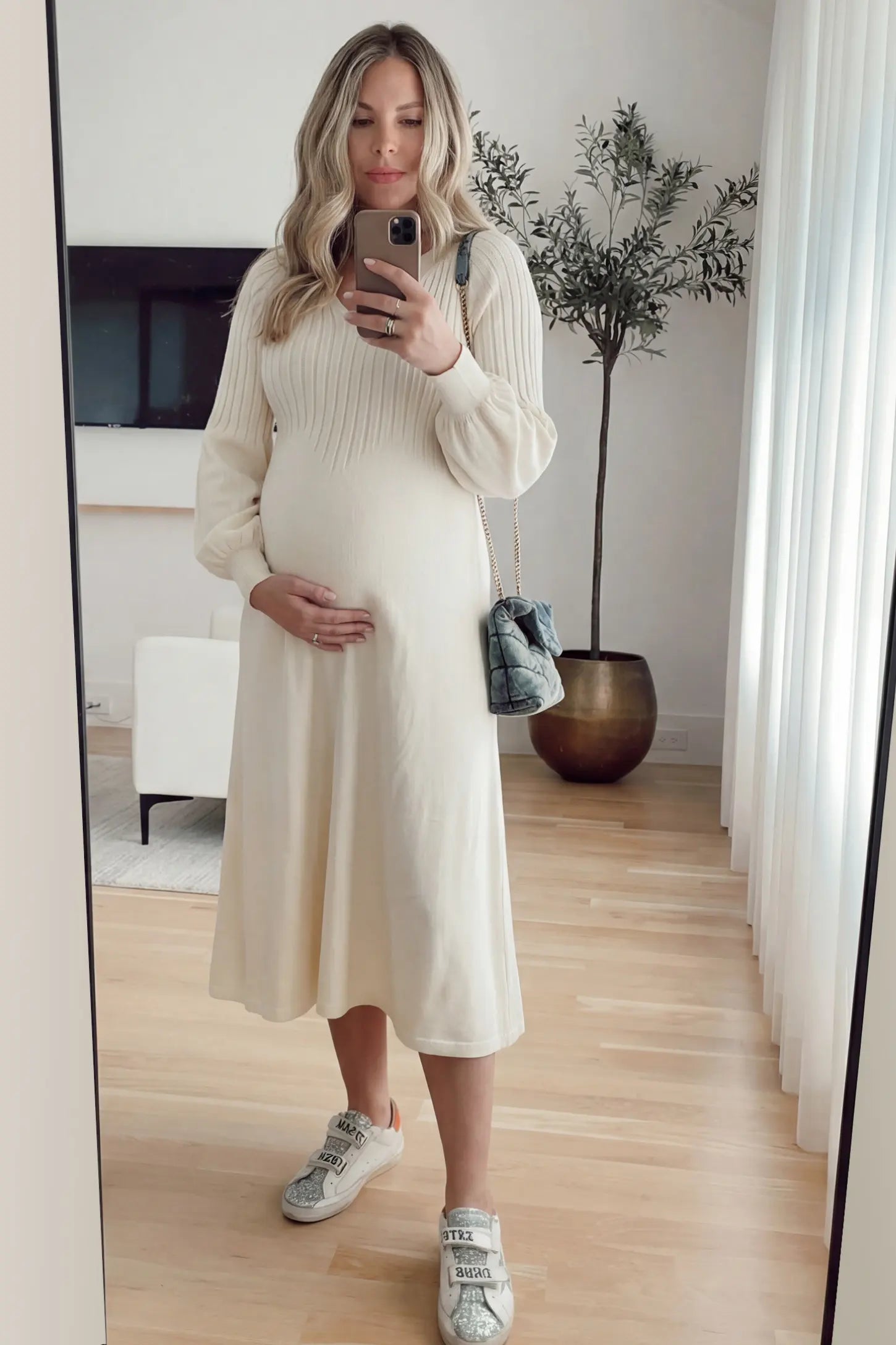 Notched Neck Long Sleeve Maternity Midi Dress Sweetheart neck long sleeve maternity midi dress in apricot with elegant long sleeves, front view on pregnant model