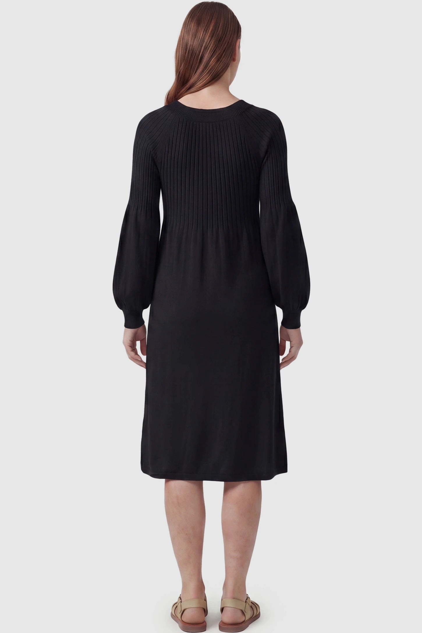 Notched Neck Long Sleeve Maternity Midi Dress Sweetheart neck long sleeve maternity midi dress in black with elegant long sleeves, back view on pregnant model