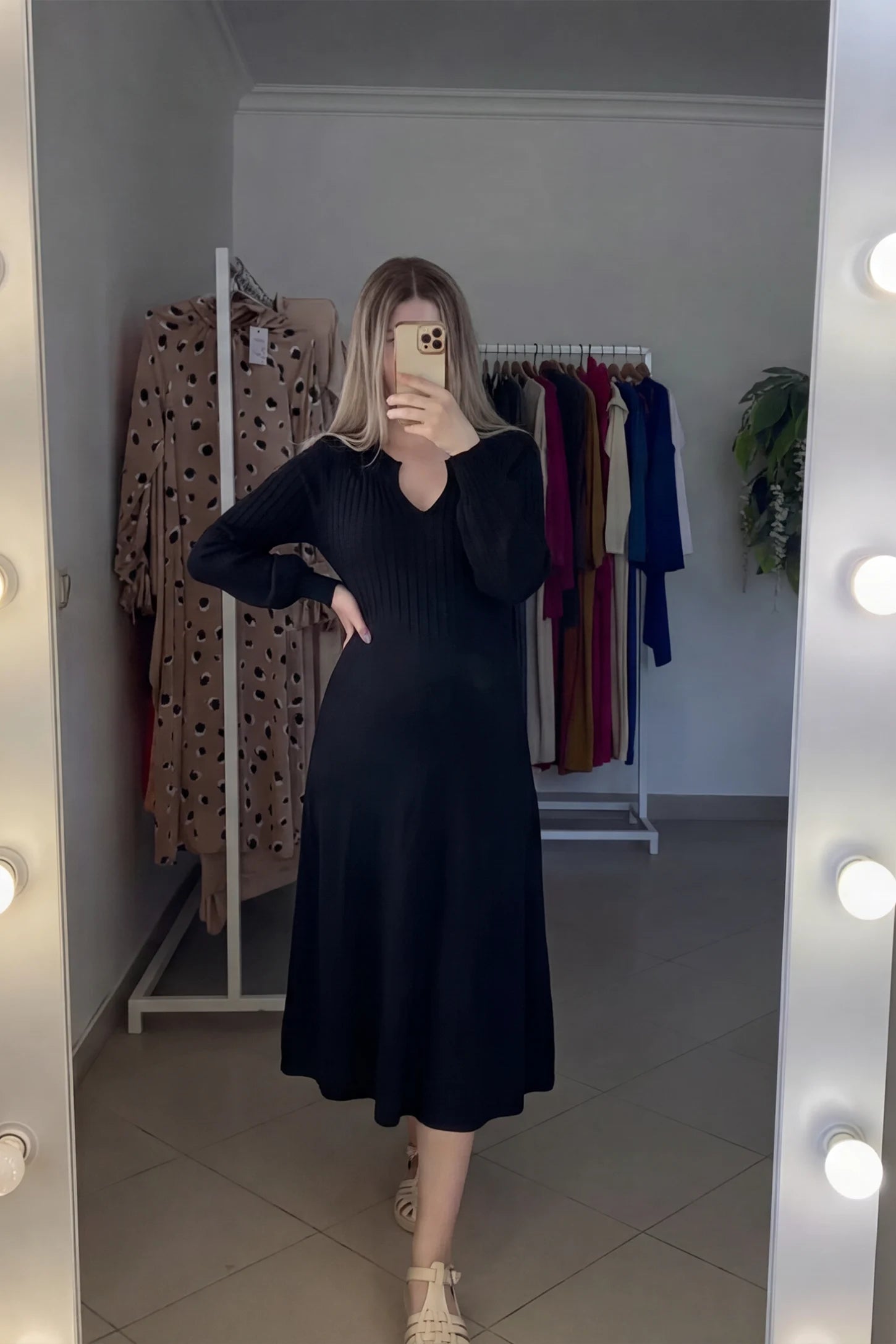Notched Neck Long Sleeve Maternity Midi Dress Sweetheart neck long sleeve maternity midi dress in black with elegant long sleeves, front view on pregnant model