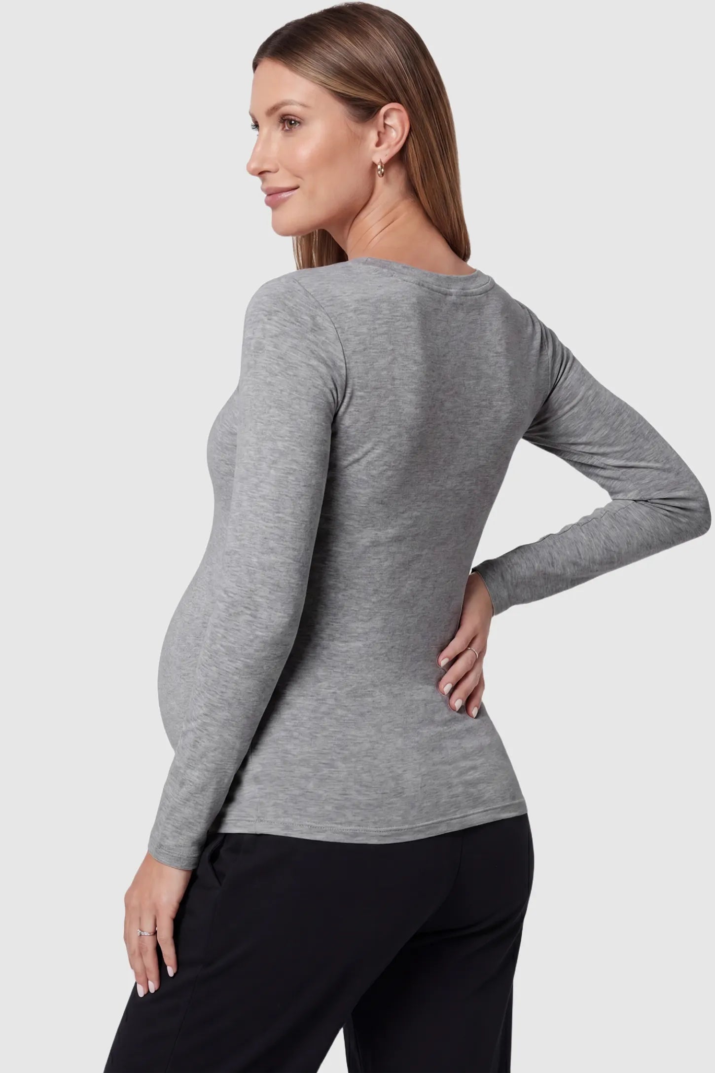Soft Knit Long Sleeve V-Neck Maternity Top Soft knit long sleeve V-neck maternity top in gray with long sleeves, back view on pregnant model